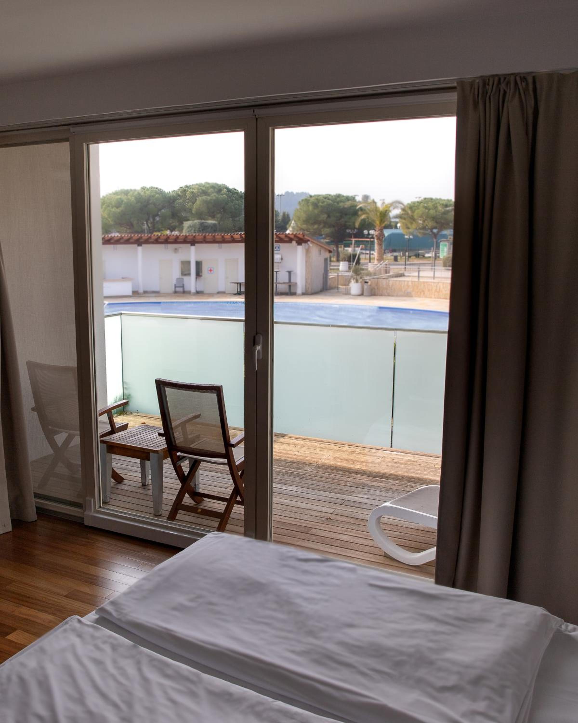 Double Room with Pool View thumbnail 5