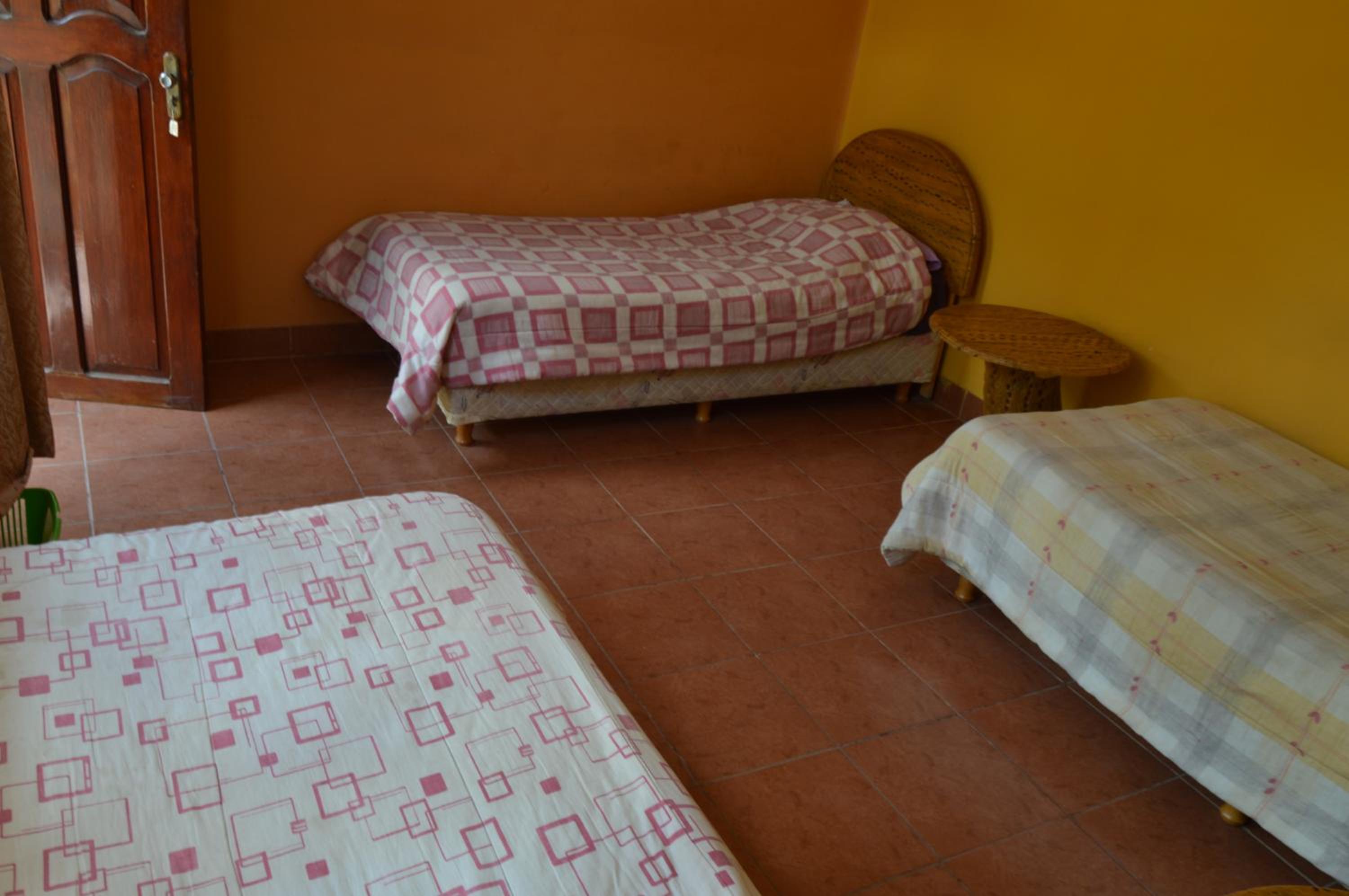 Economy Triple Room with Shared Bathroom photo 1