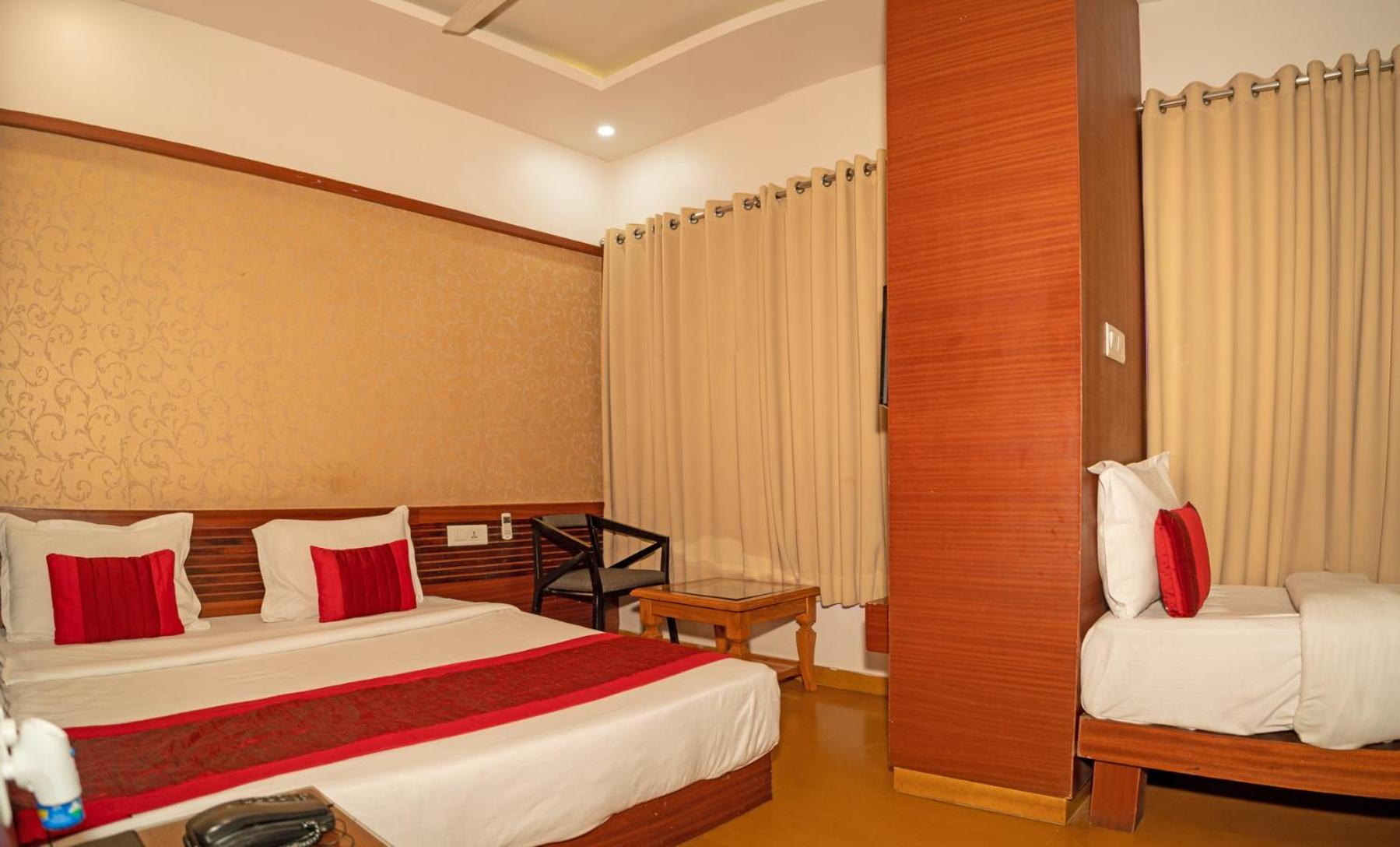 Deluxe Triple Room (Sanitized)): 10% off on Room Upgrade, Subject to availability, 20% off on Meal Upgrade, 10% off on Two -way Airport Transfer, 10% Off on Early Check-in upto 2 hours {Subject to Availability}, Free Linen Change - Photo 1