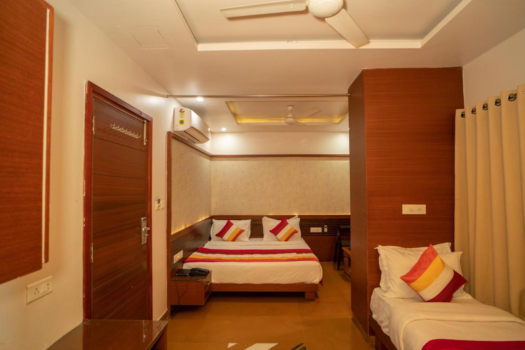 Deluxe Triple Room (Sanitized)): 10% off on Room Upgrade, Subject to availability, 20% off on Meal Upgrade, 10% off on Two -way Airport Transfer, 10% Off on Early Check-in upto 2 hours {Subject to Availability}, Free Linen Change - Photo 2