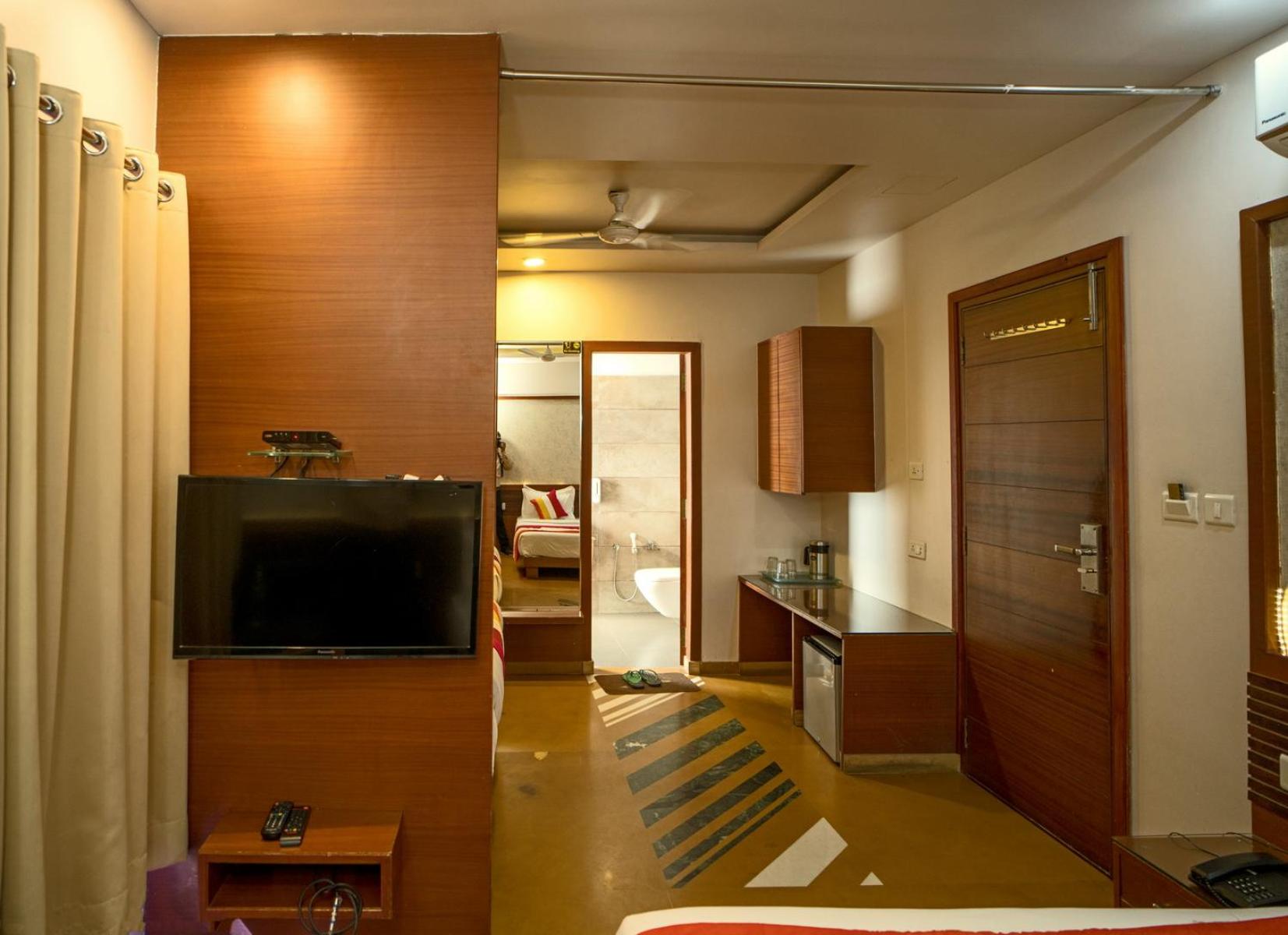 Deluxe Triple Room (Sanitized)): 10% off on Room Upgrade, Subject to availability, 20% off on Meal Upgrade, 10% off on Two -way Airport Transfer, 10% Off on Early Check-in upto 2 hours {Subject to Availability}, Free Linen Change - Photo 3