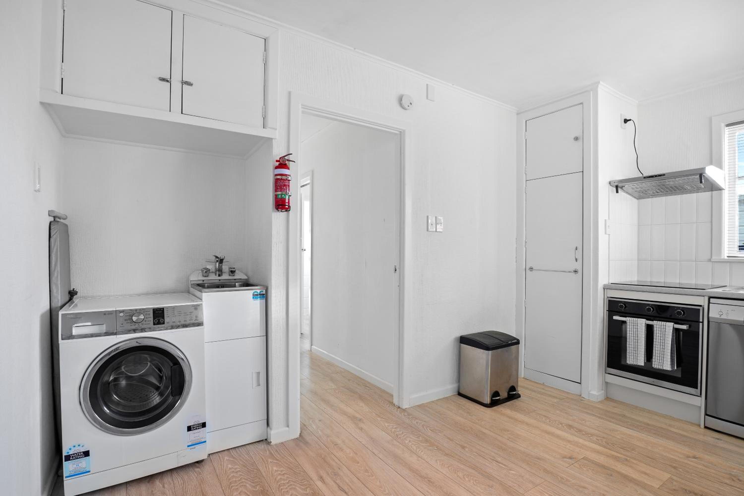 Three-Bedroom House - Photo 27