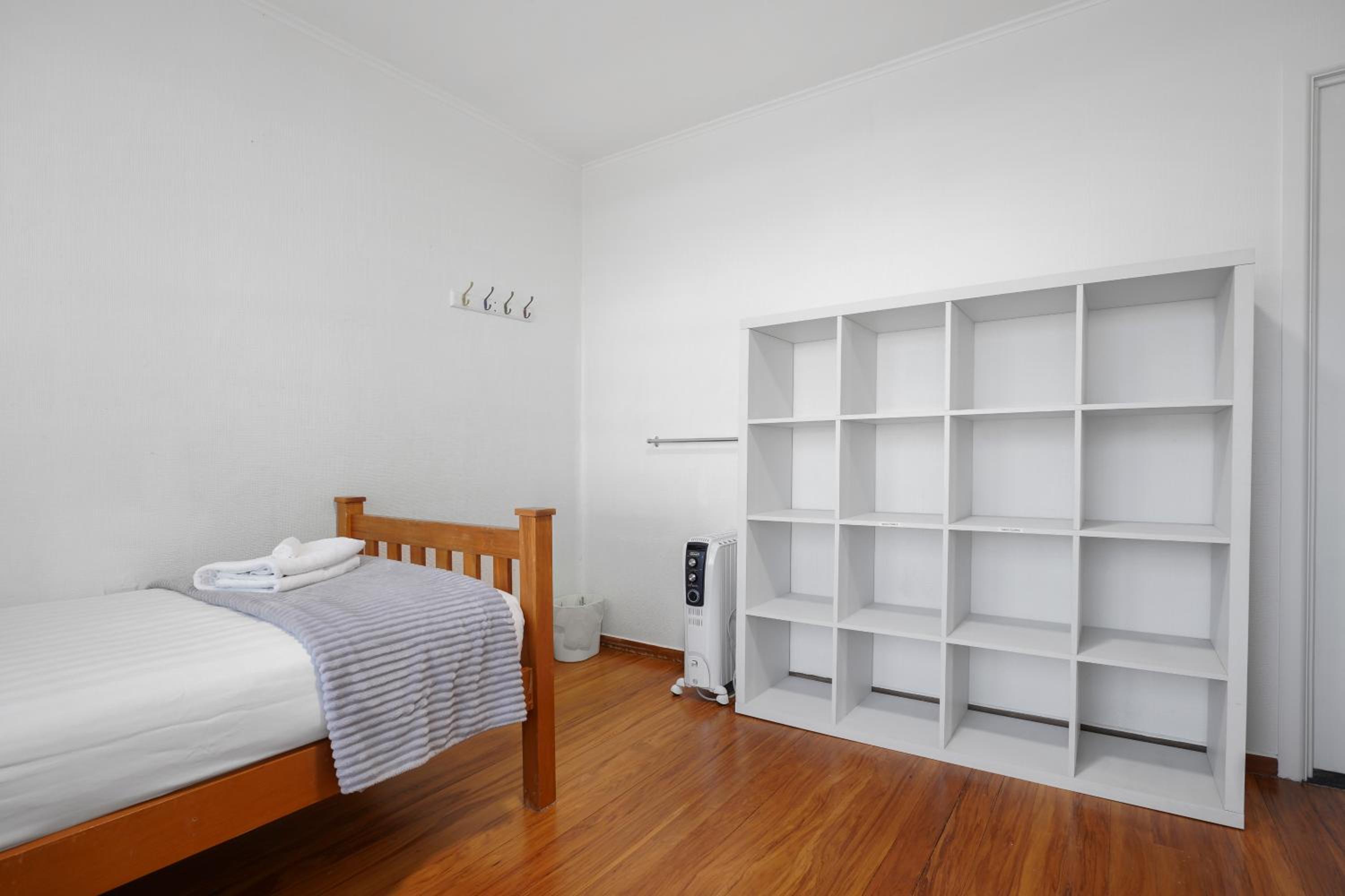 Three-Bedroom House - Photo 25