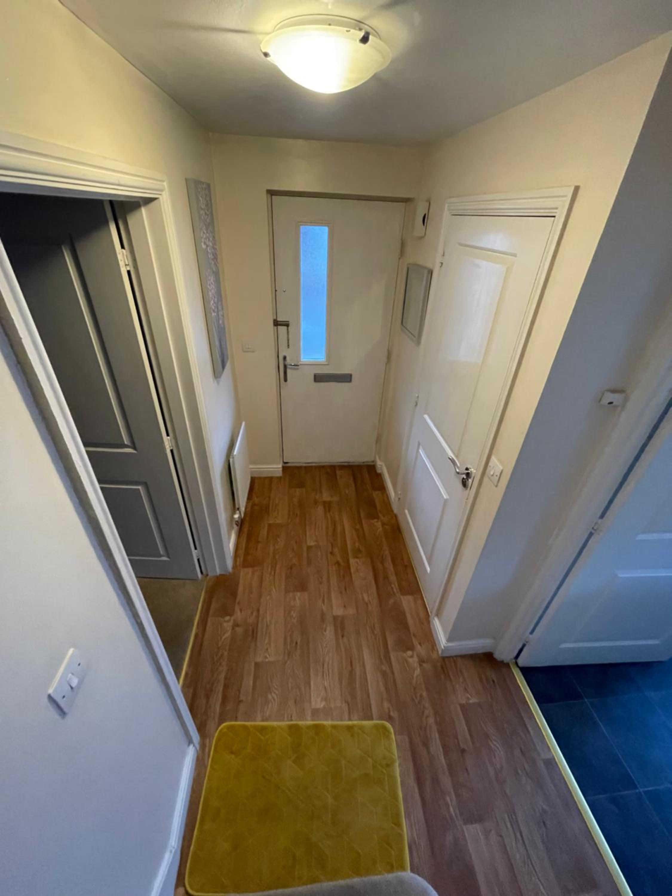 Three-Bedroom House - Photo 16