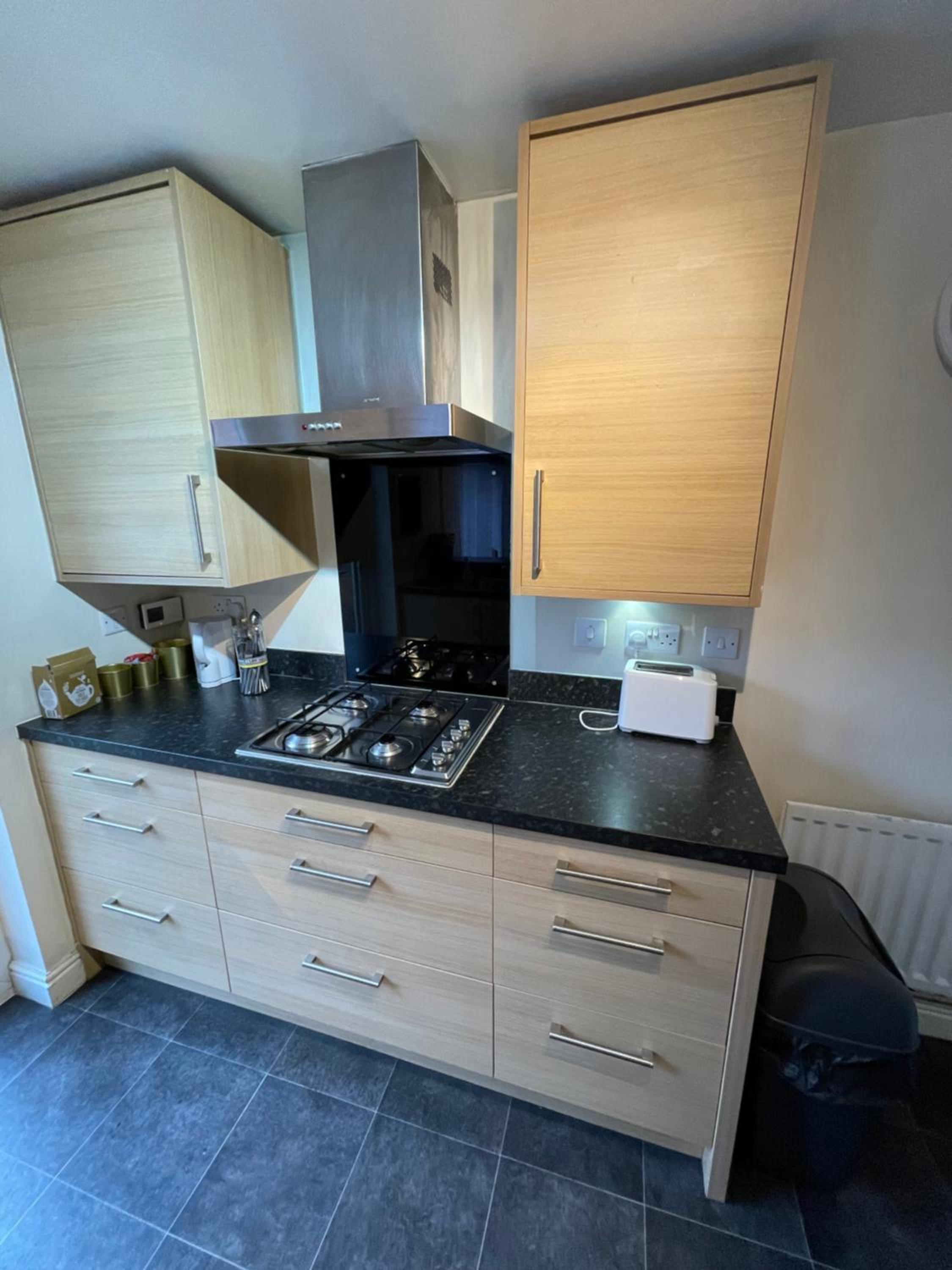Three-Bedroom House - Photo 20