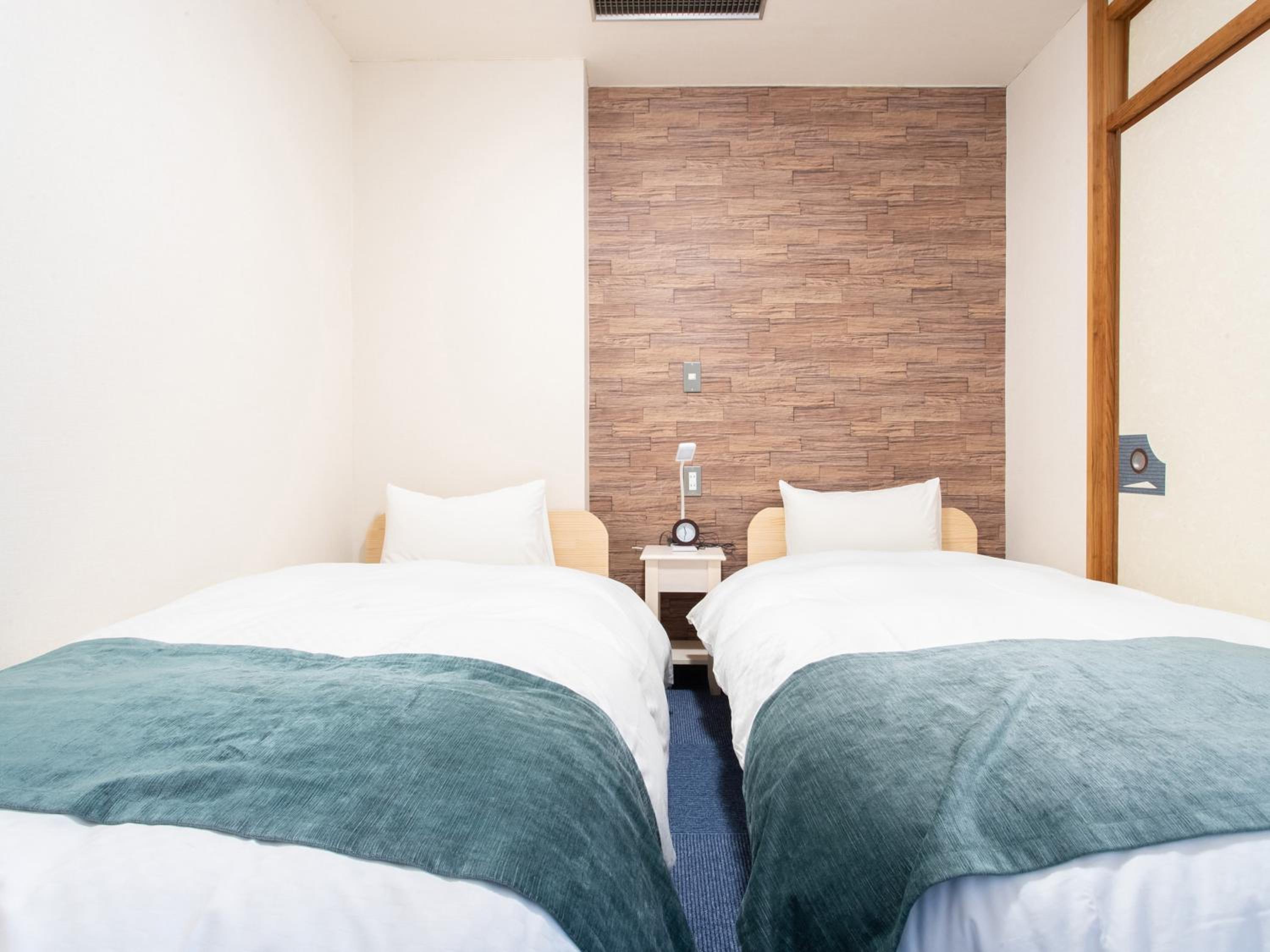 Standard Quadruple Room - Photo 15