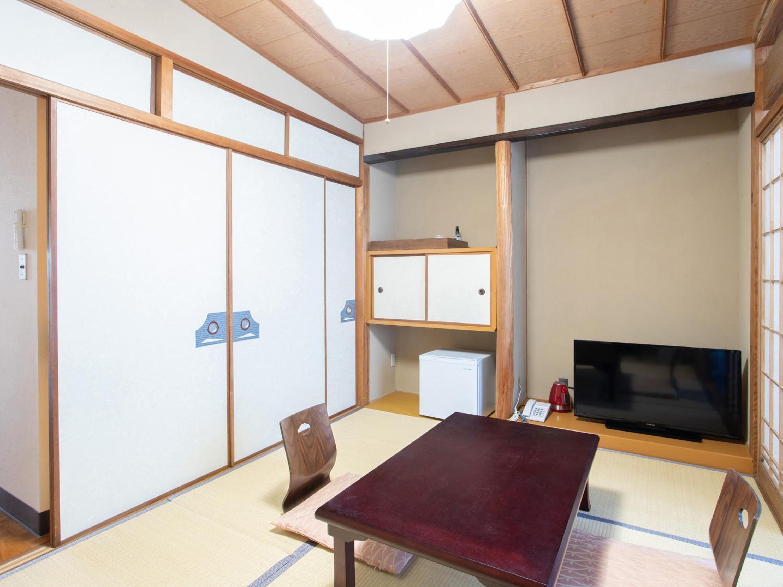 Standard Quadruple Room - Photo 7