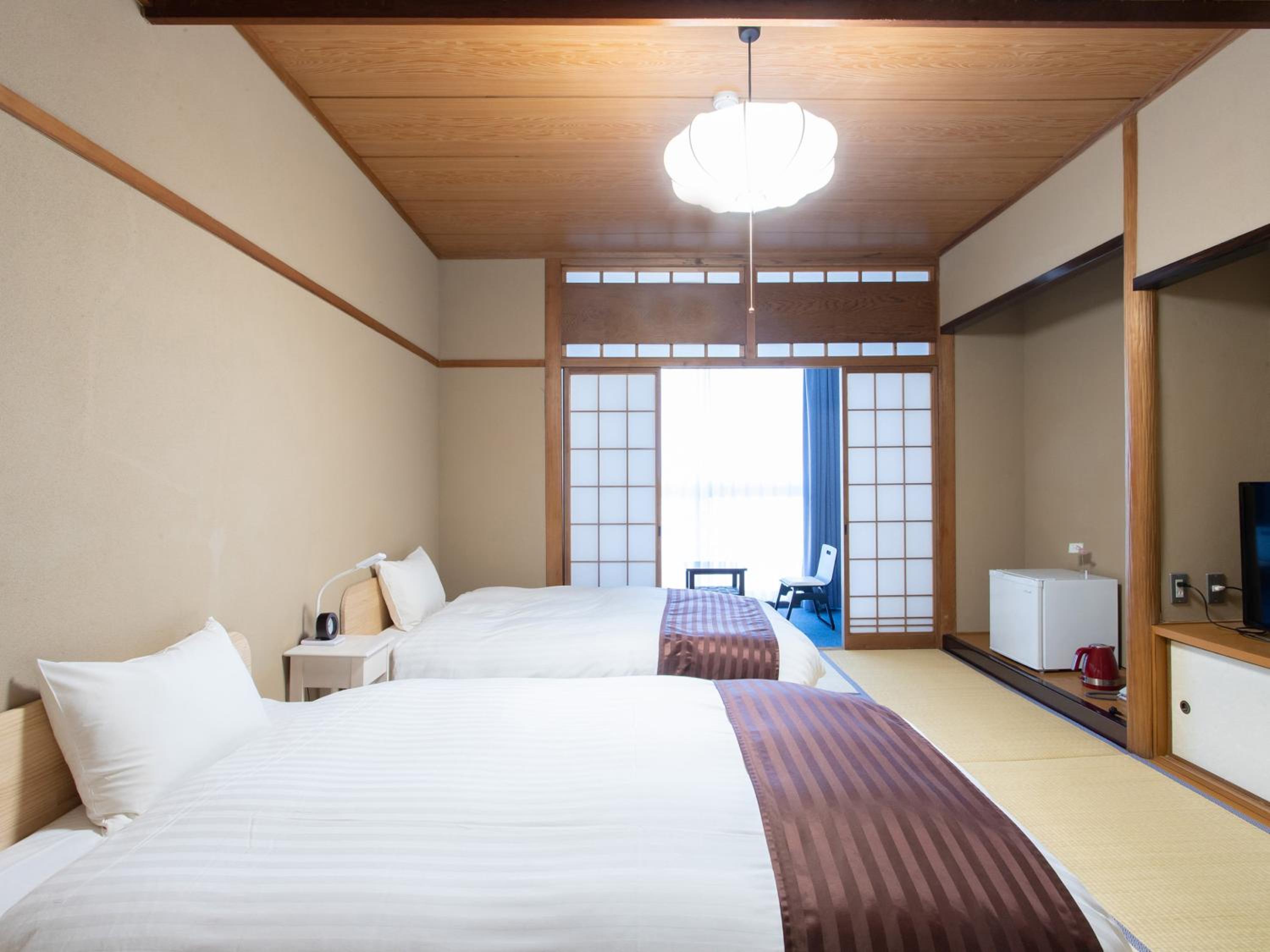 Standard Twin Room - Photo 1