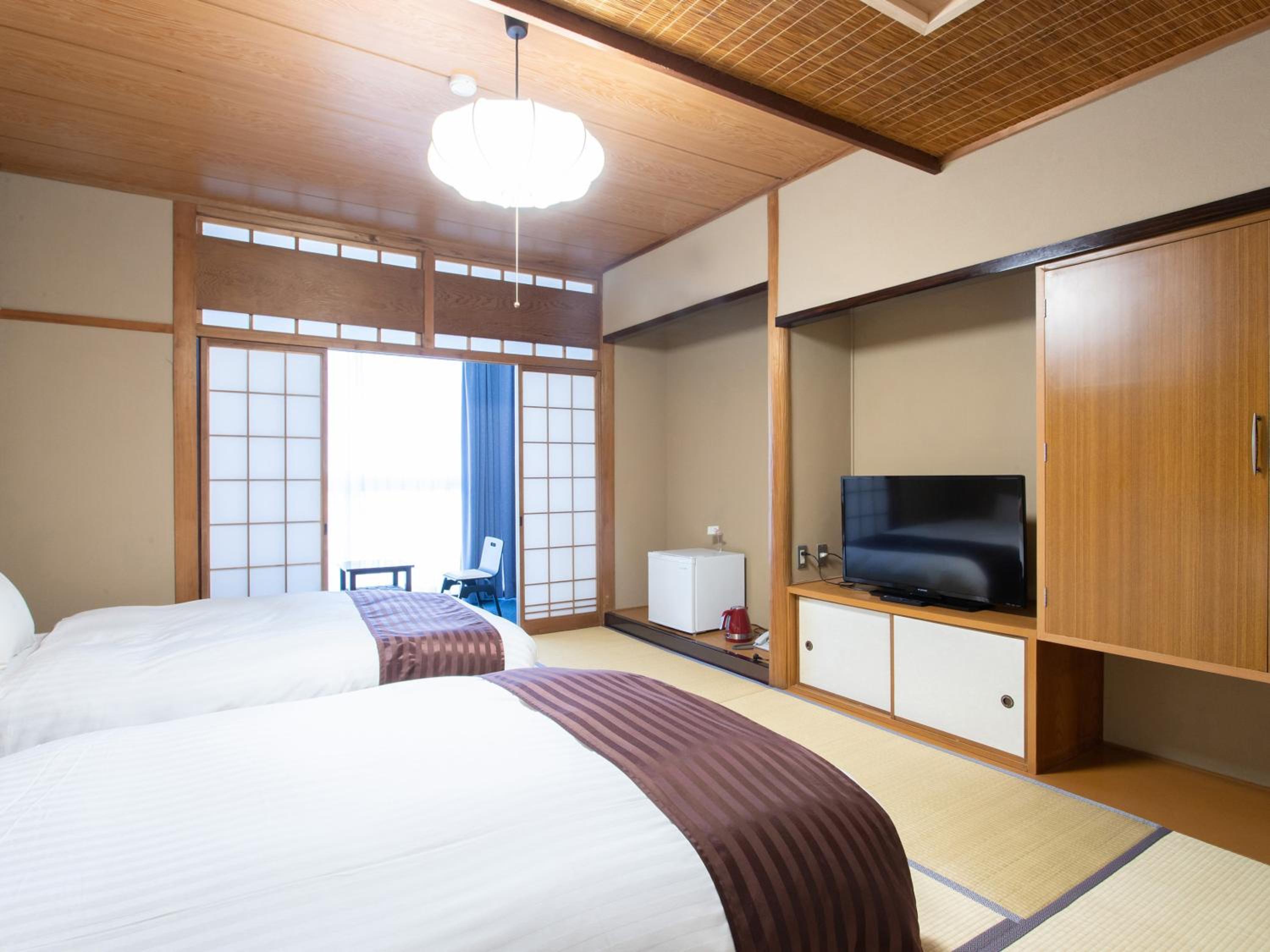 Standard Twin Room - Photo 15