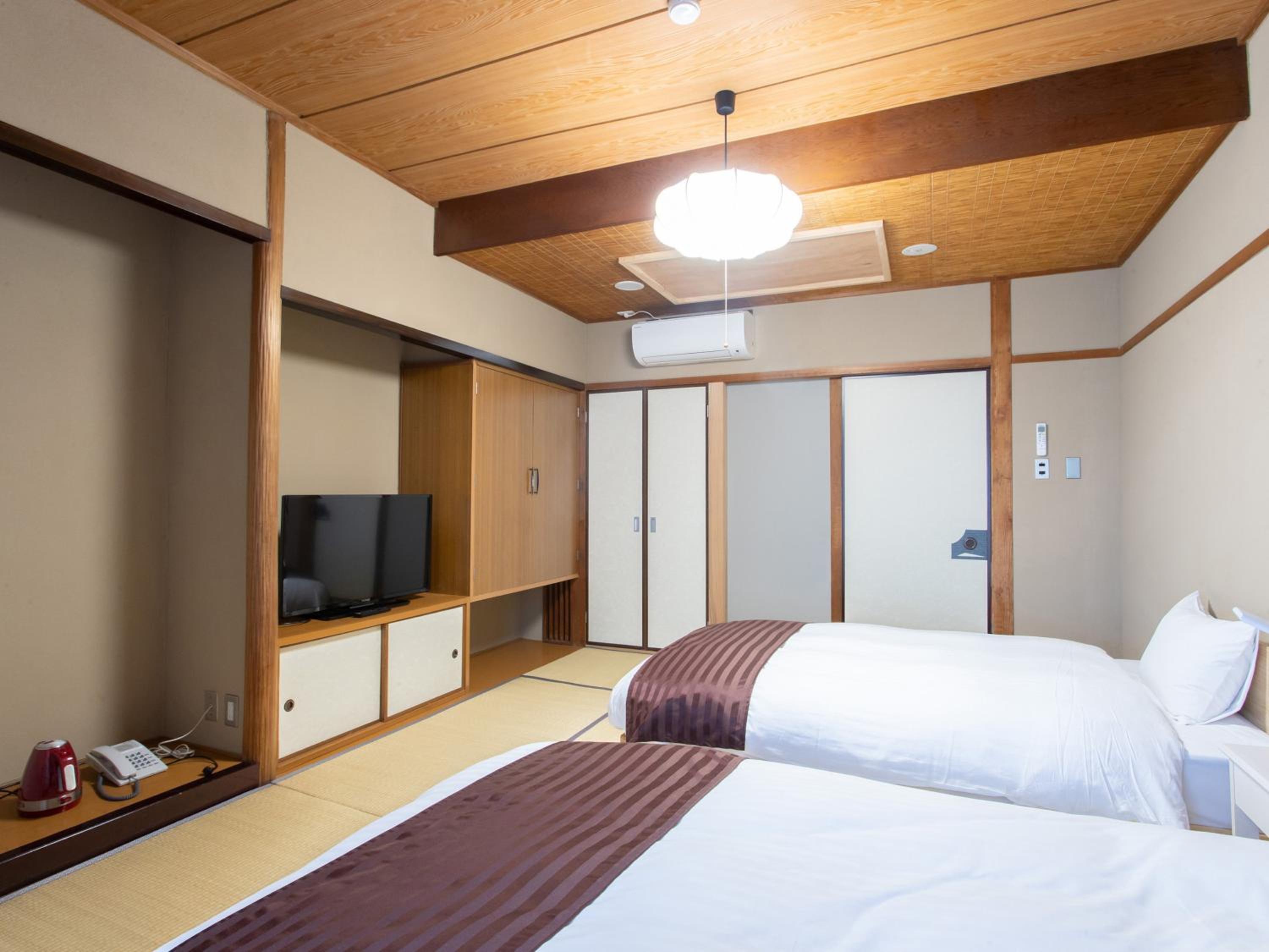 Standard Twin Room - Photo 14