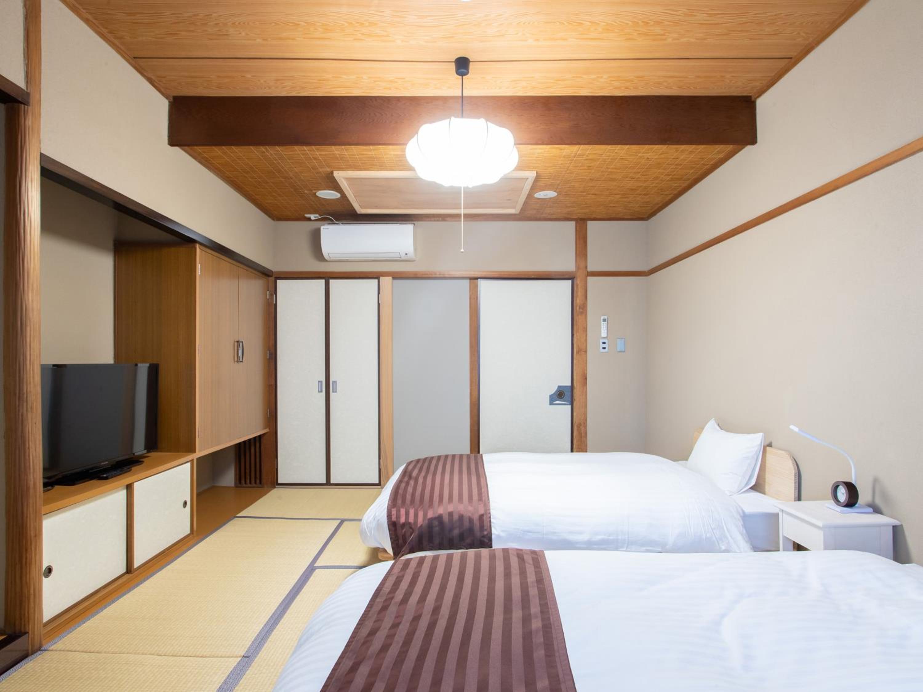 Standard Twin Room - Photo 2