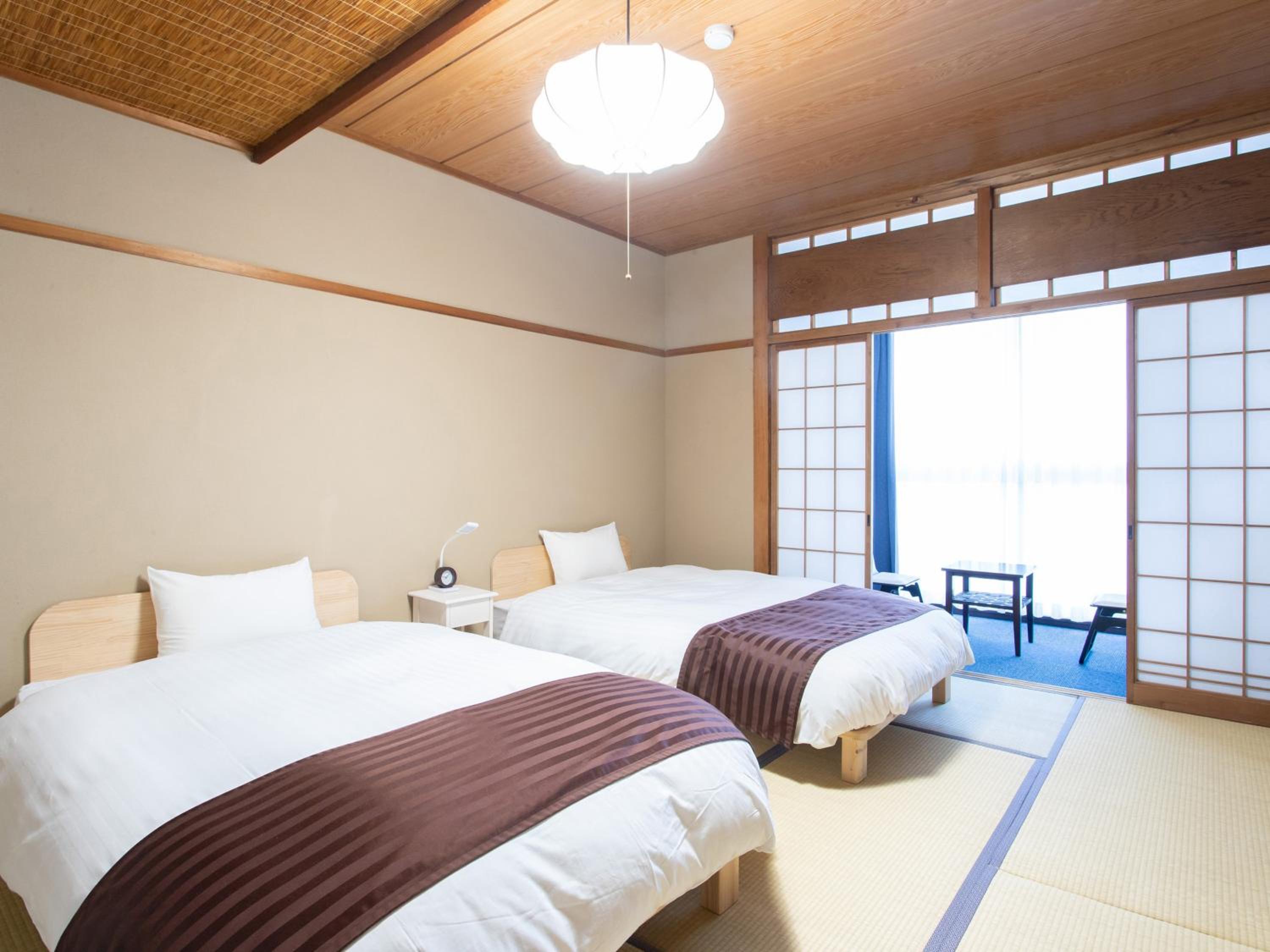 Standard Twin Room - Photo 10