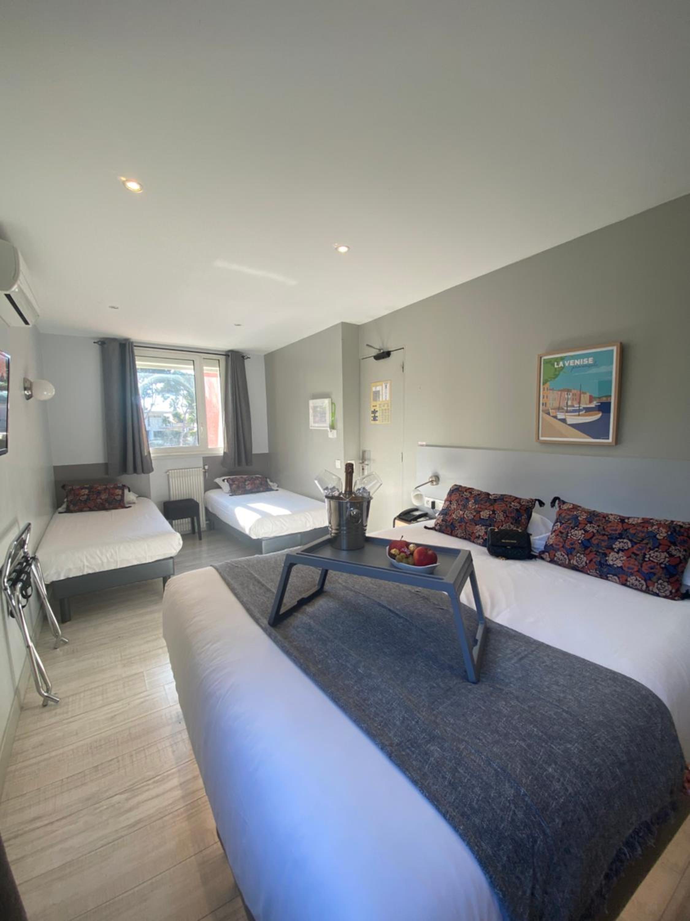 Comfort Quadruple Room - Swimming pool view