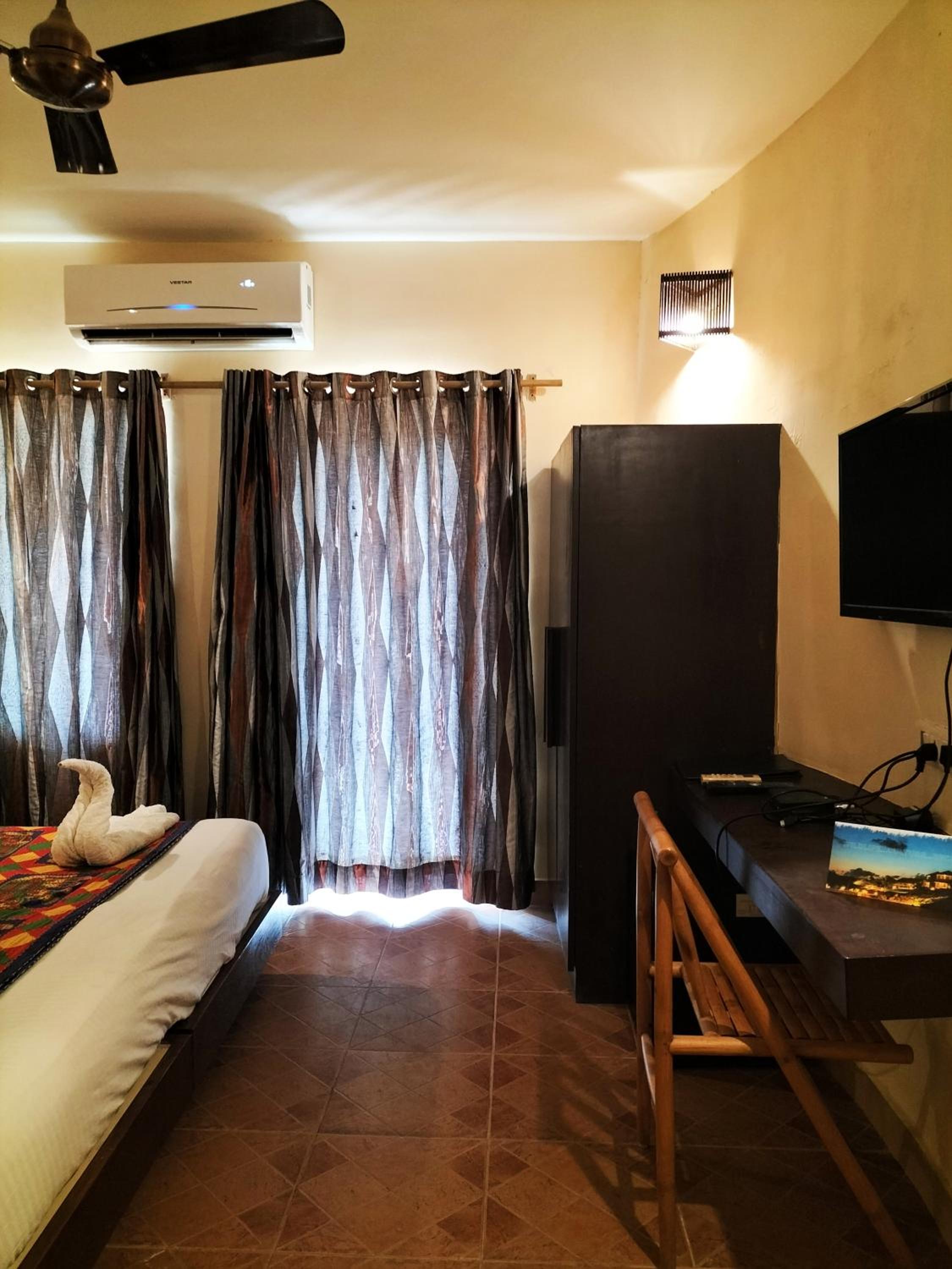 Deluxe Room - Photo 6