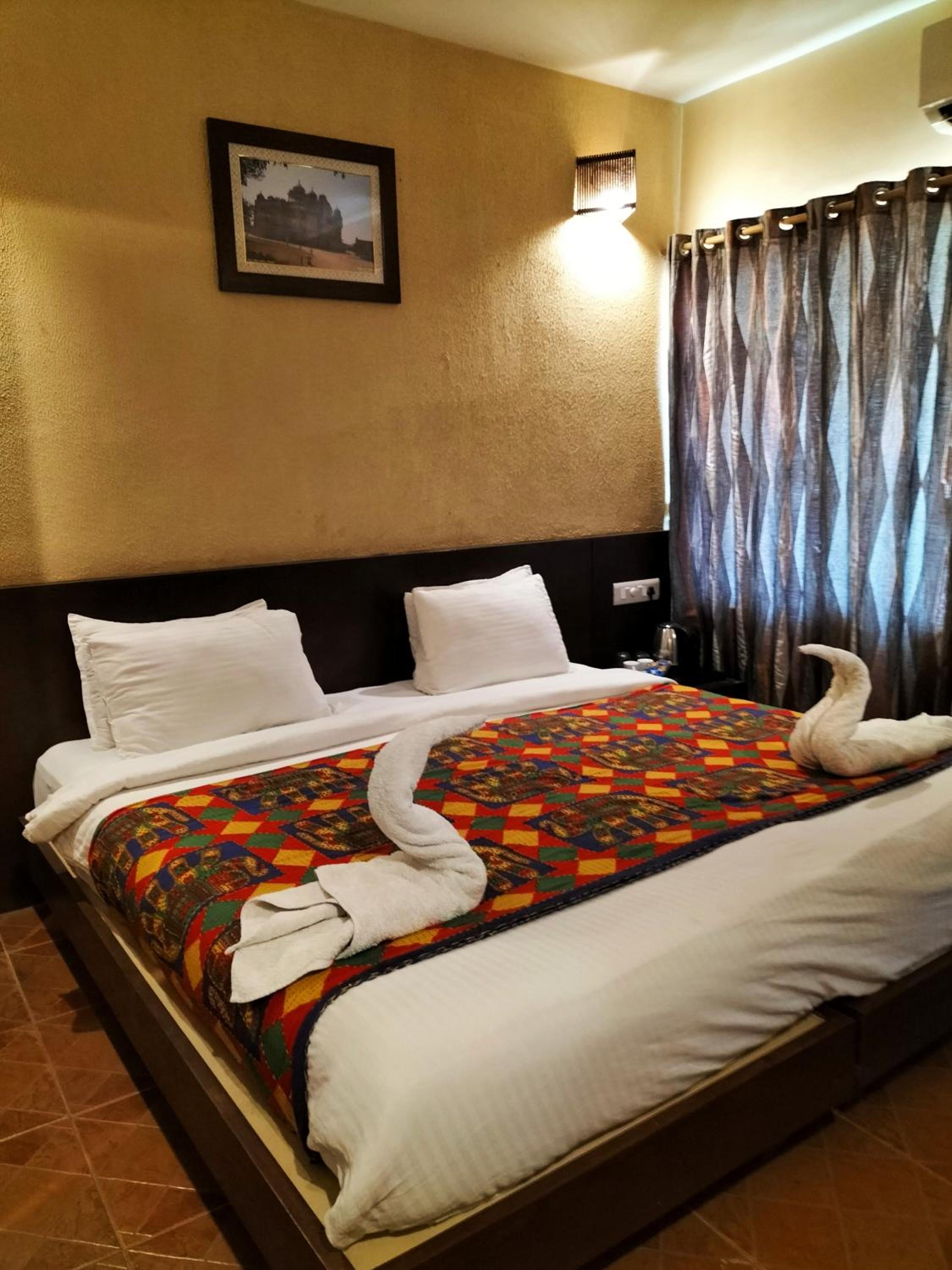 Deluxe Room - Photo 10