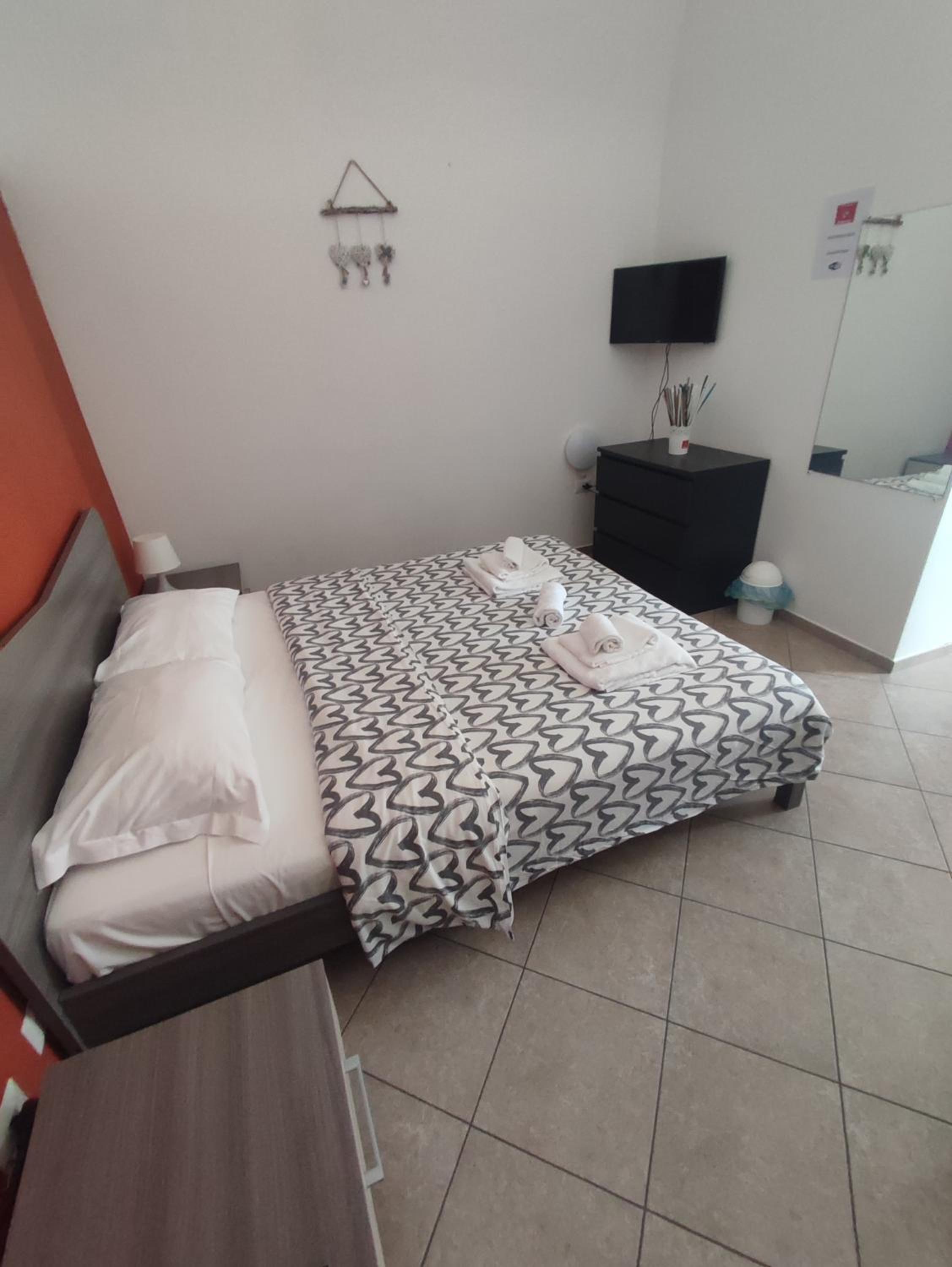Standard Quadruple Room - Photo 9