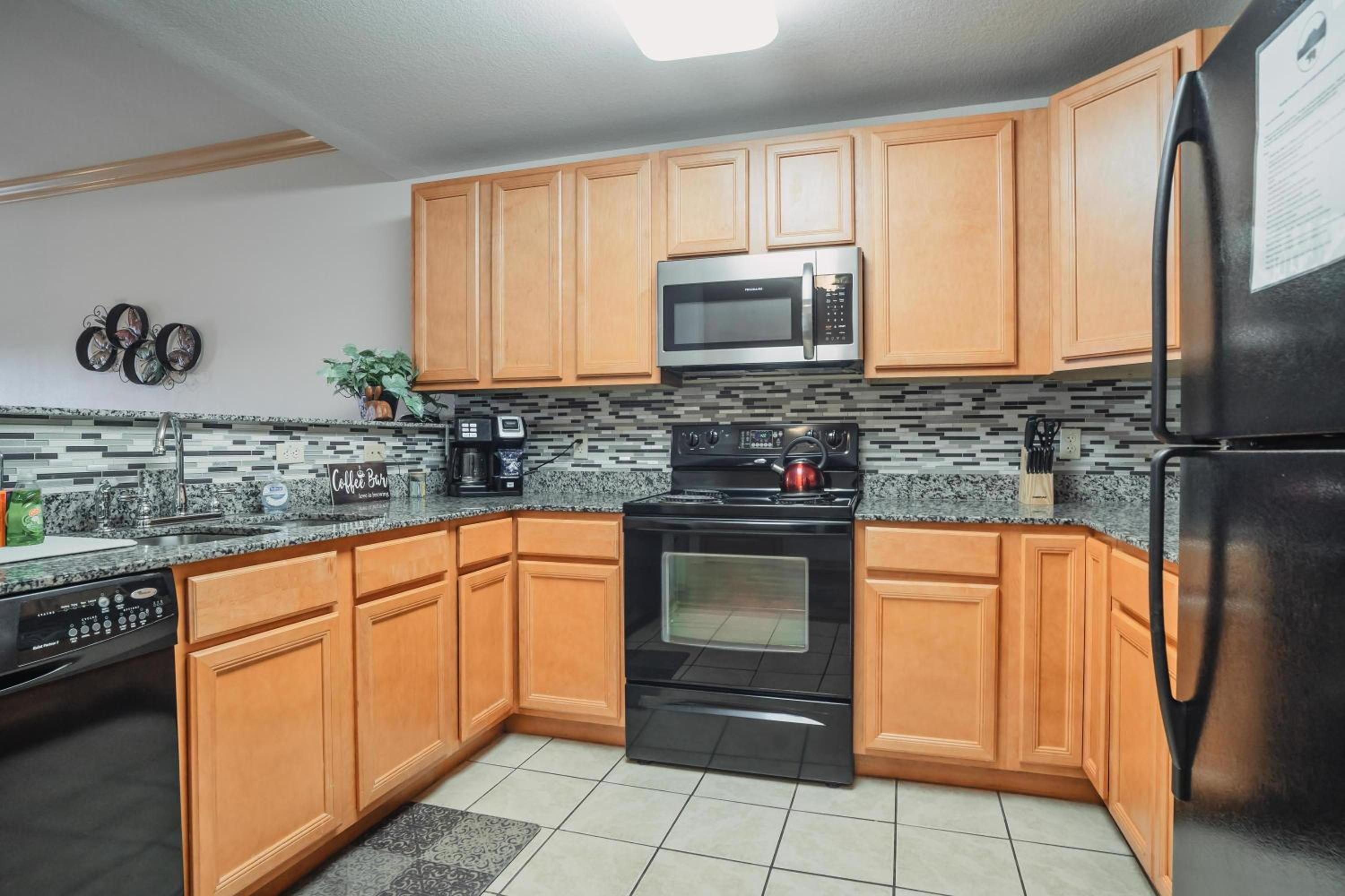 Three-Bedroom Condo - Photo 6