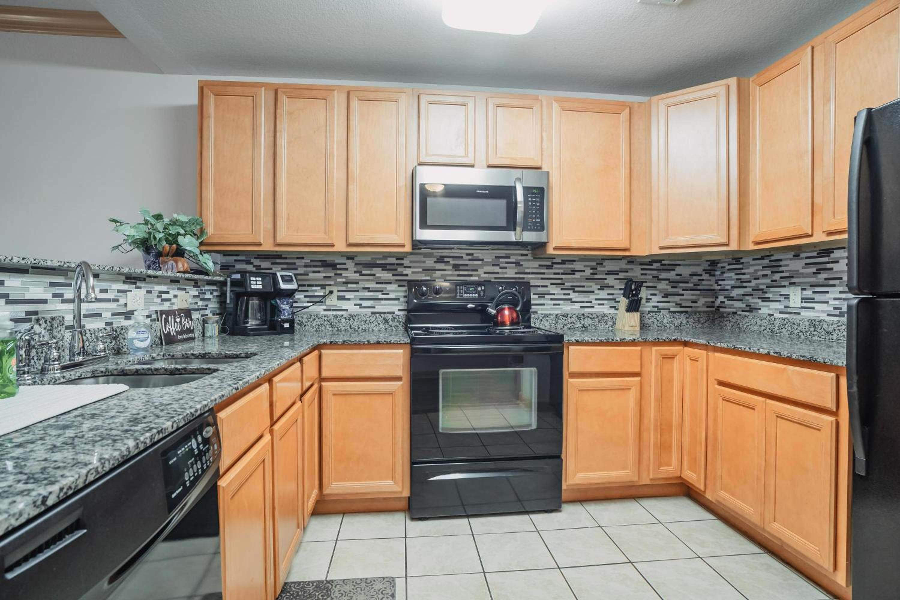 Three-Bedroom Condo - Photo 3