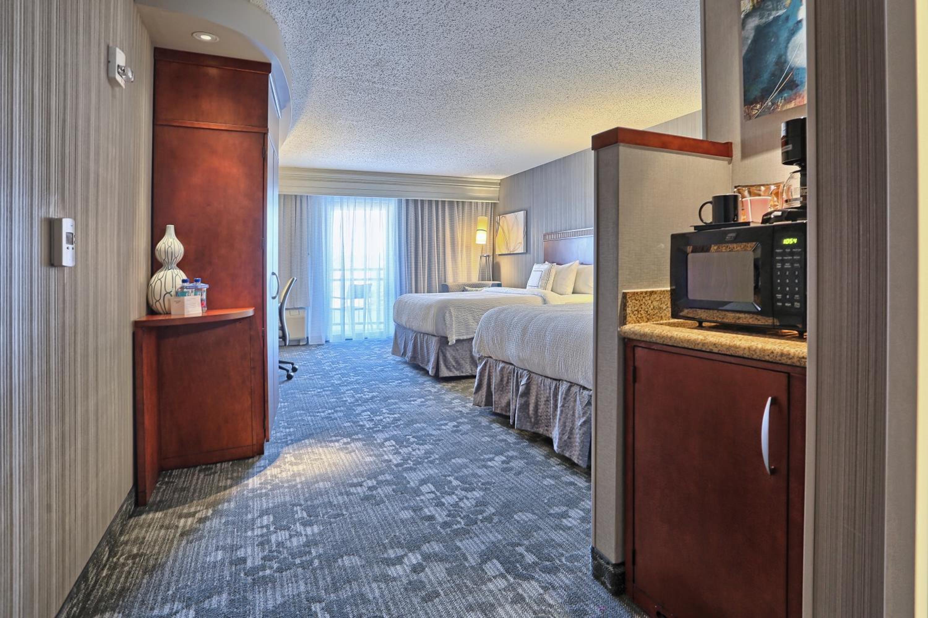 Queen Room with Two Queen Beds - Photo 1