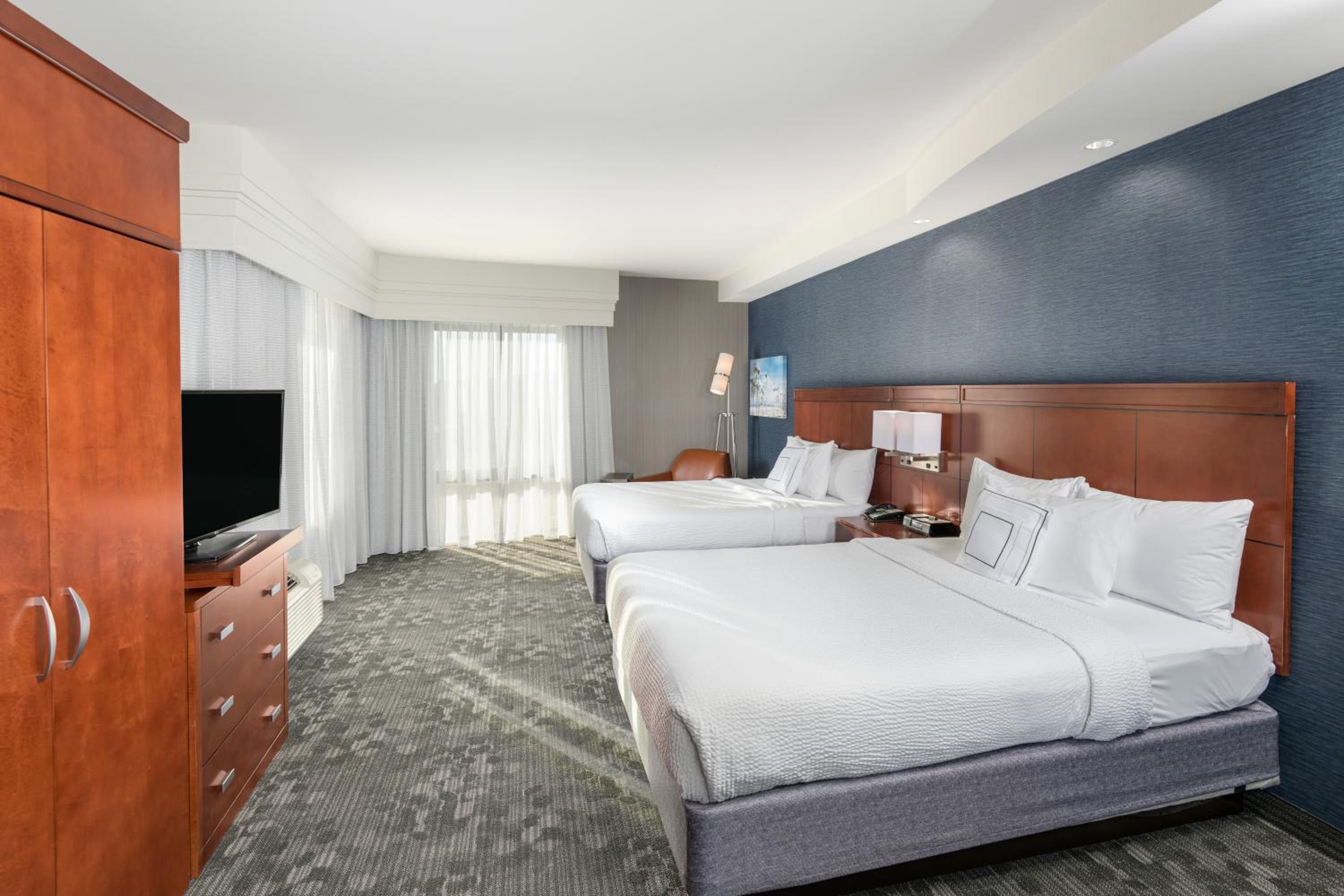 Queen Room with Two Queen Beds - Photo 1