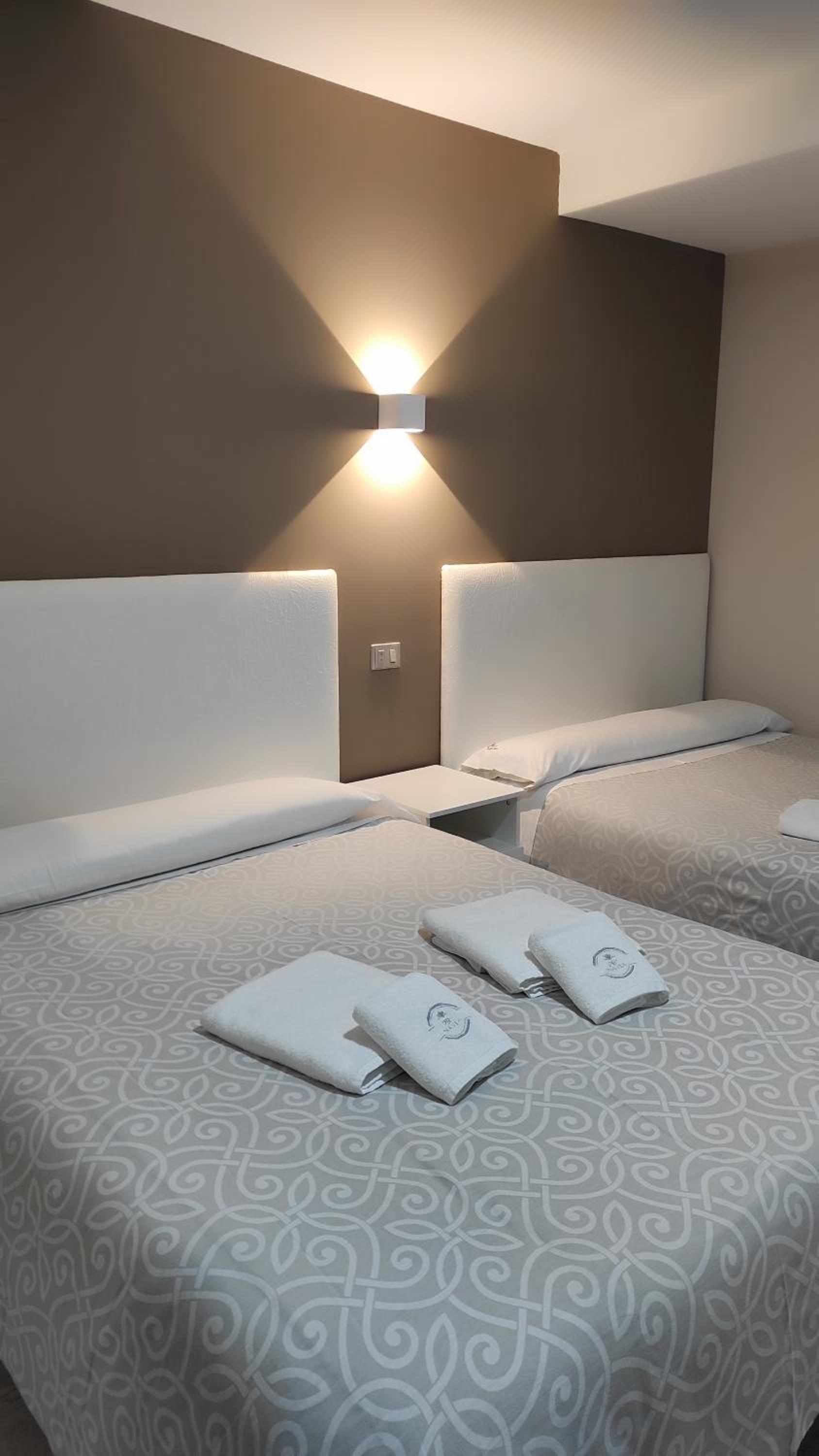 Habitación Doble con Dos Camas Dobles