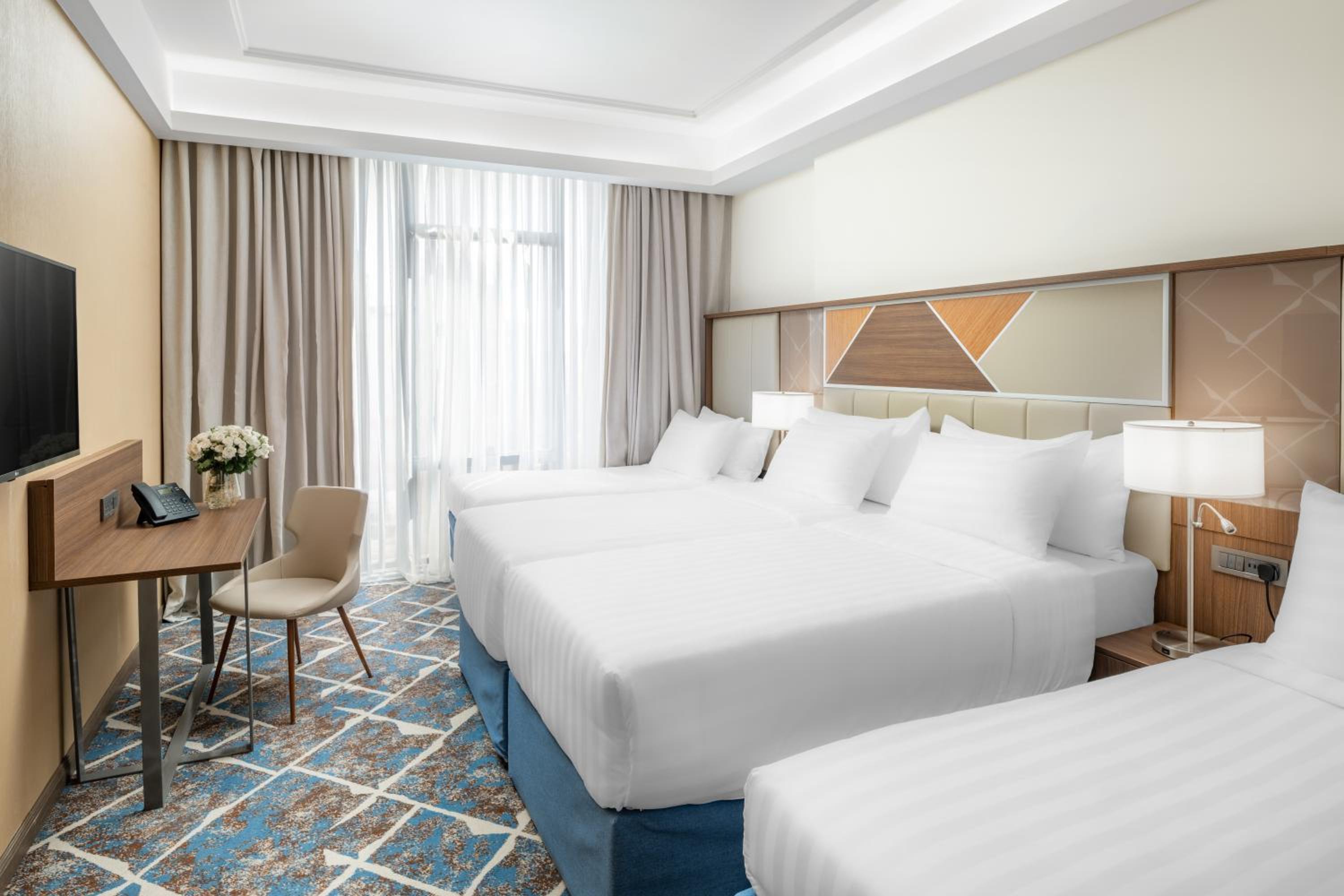 Economy Quadruple Room - Photo 4