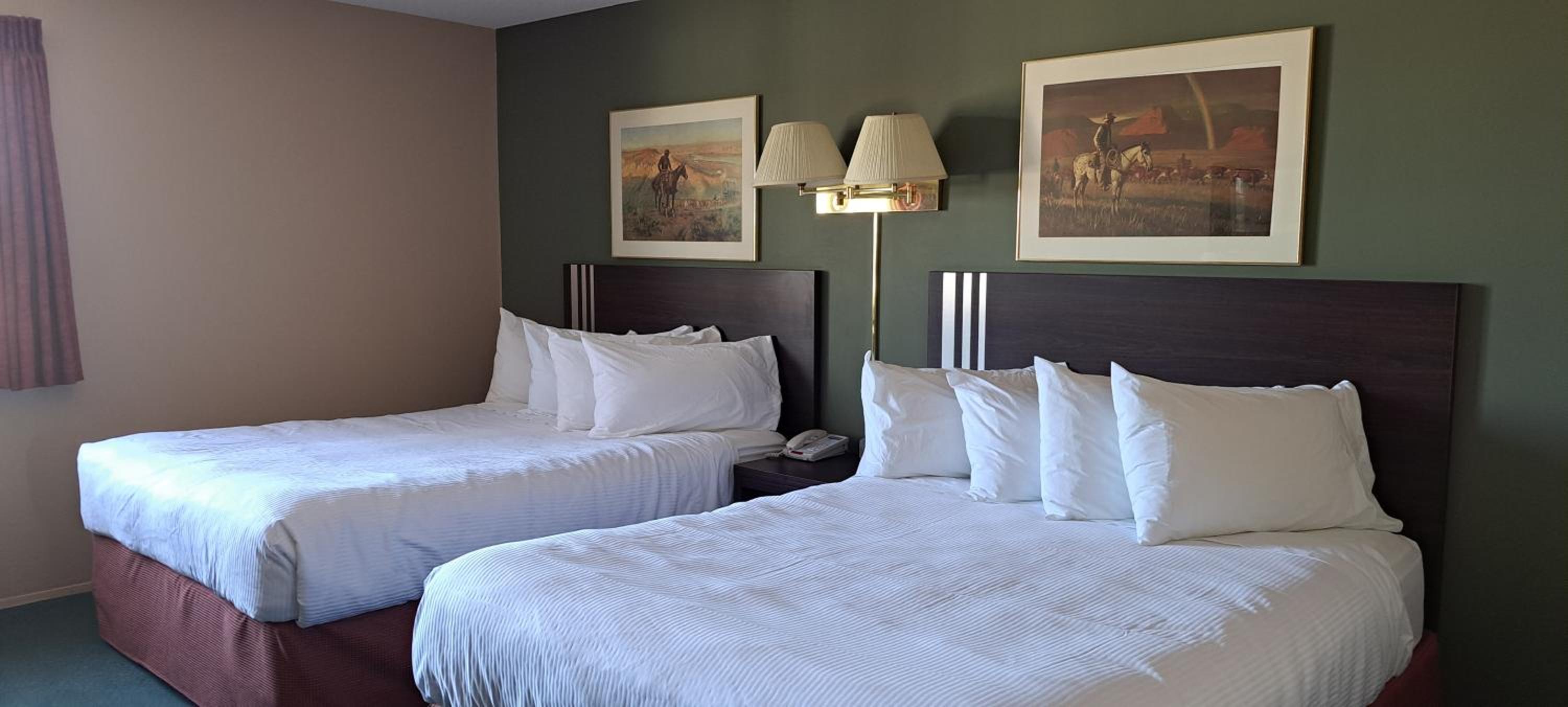 Deluxe Queen Room with Two Queen Beds - Non-Smoking photo 1