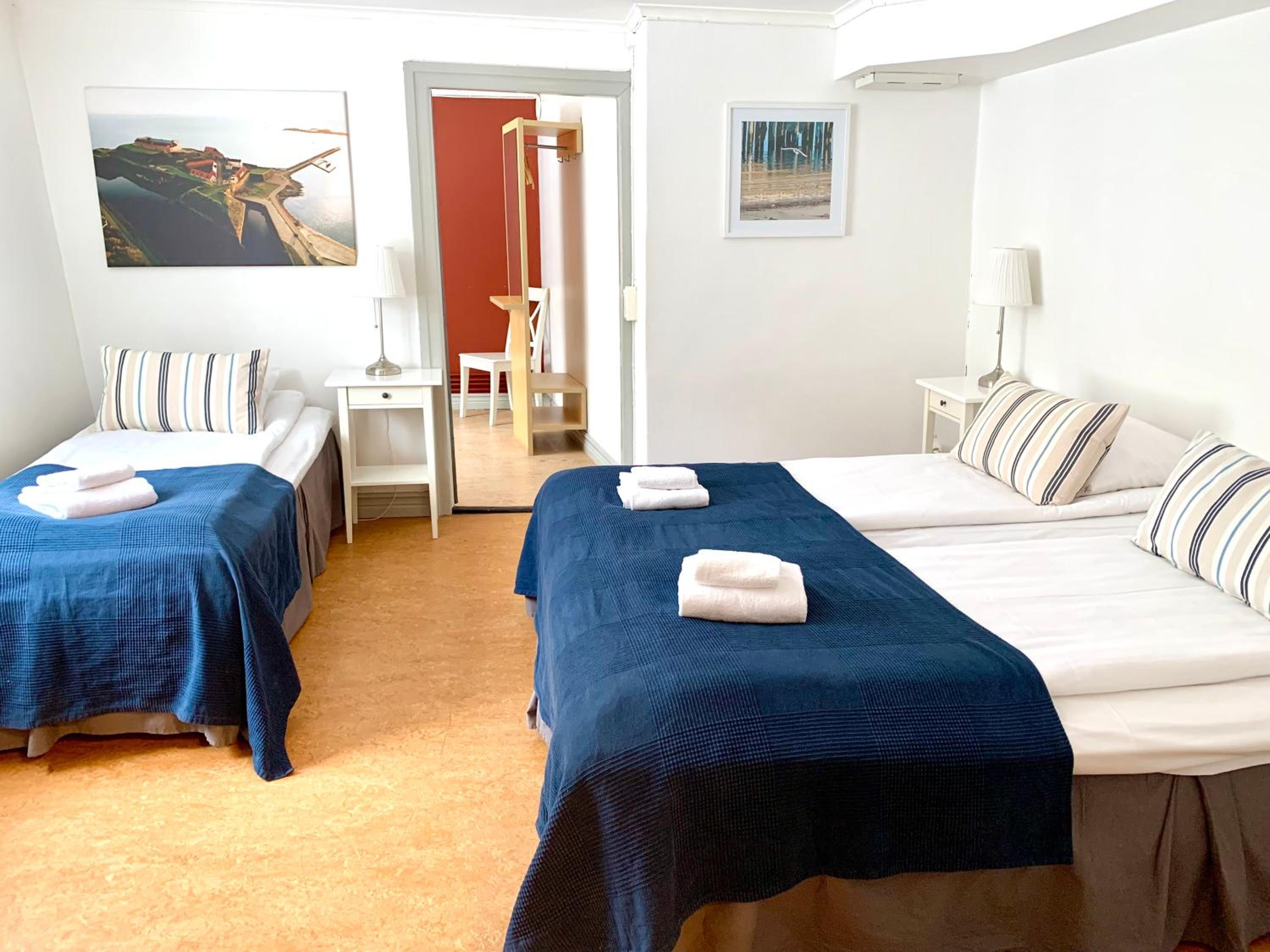 Triple Room with Private Toilet (outside the room) and Shared Shower photo 1