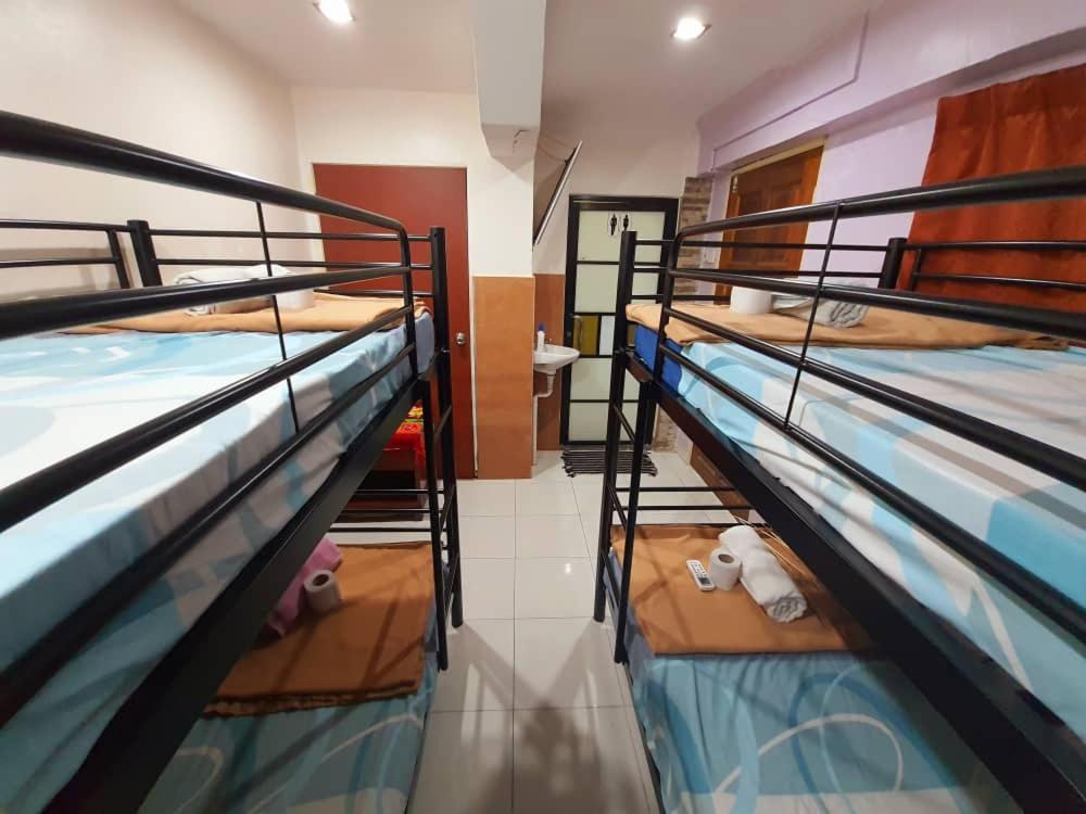 Single Bed In Female Dormitory Room