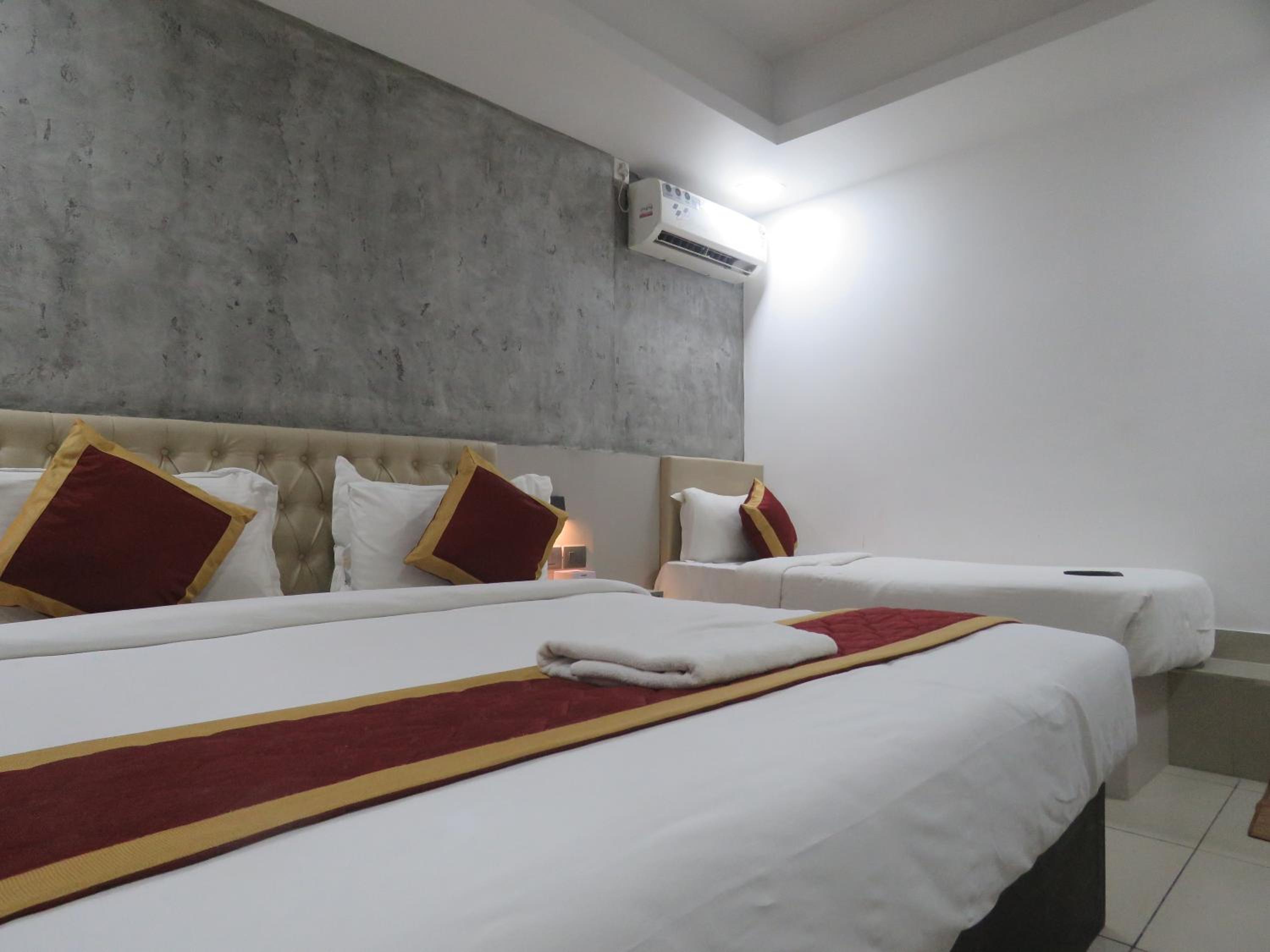 Deluxe Triple Room - Photo 14