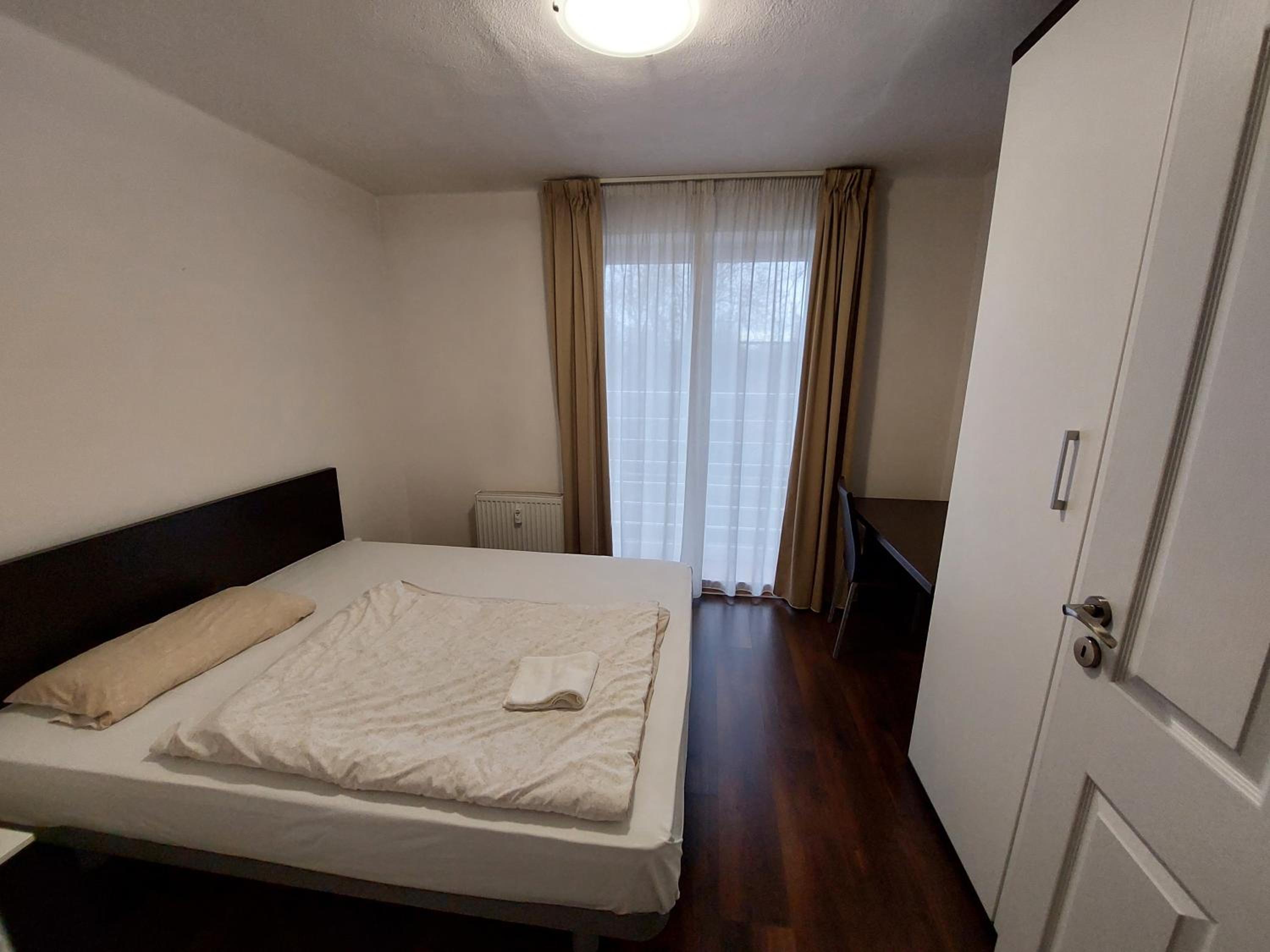 Three-Bedroom Apartment - Photo 5