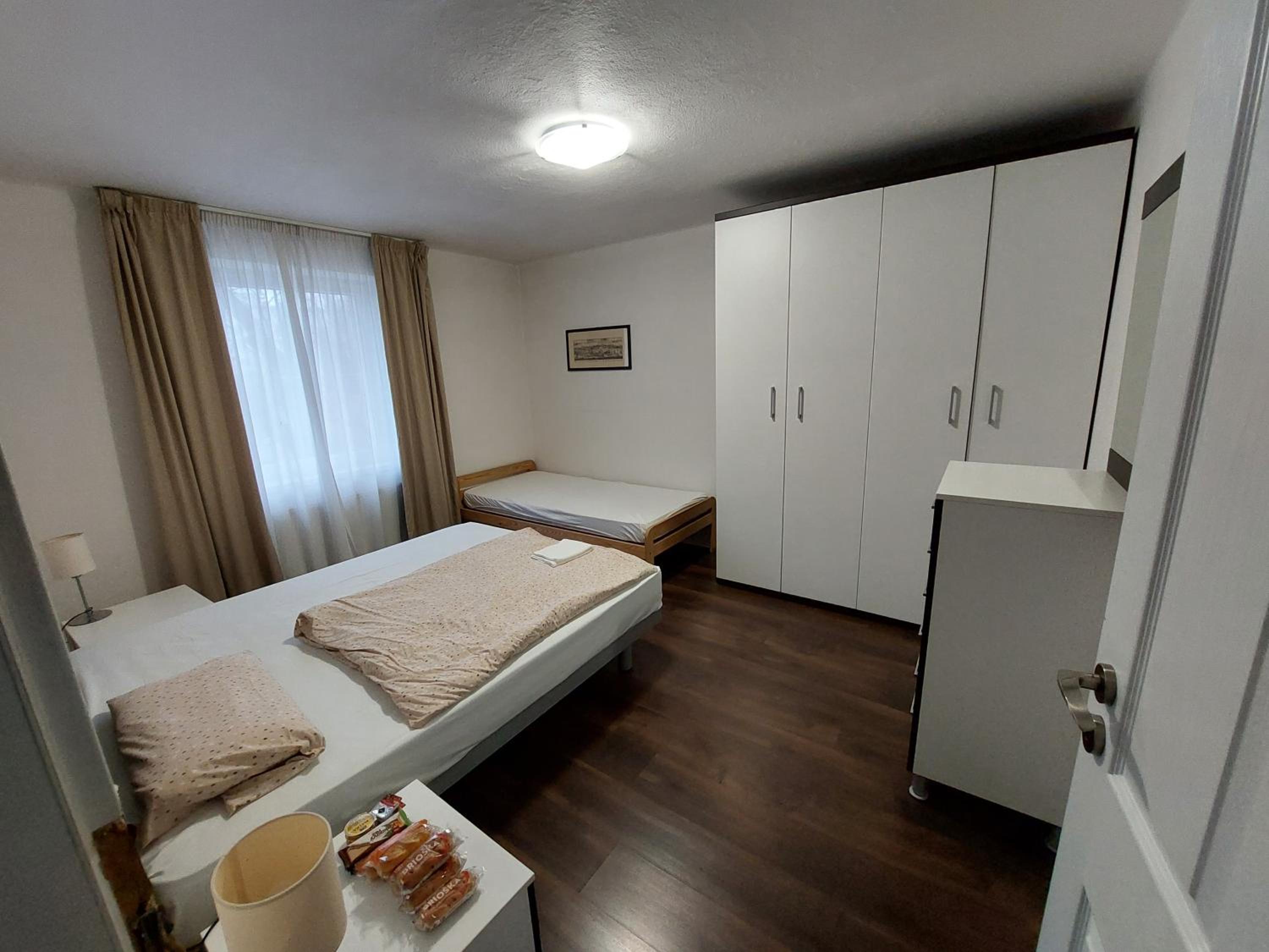 Three-Bedroom Apartment - Photo 3