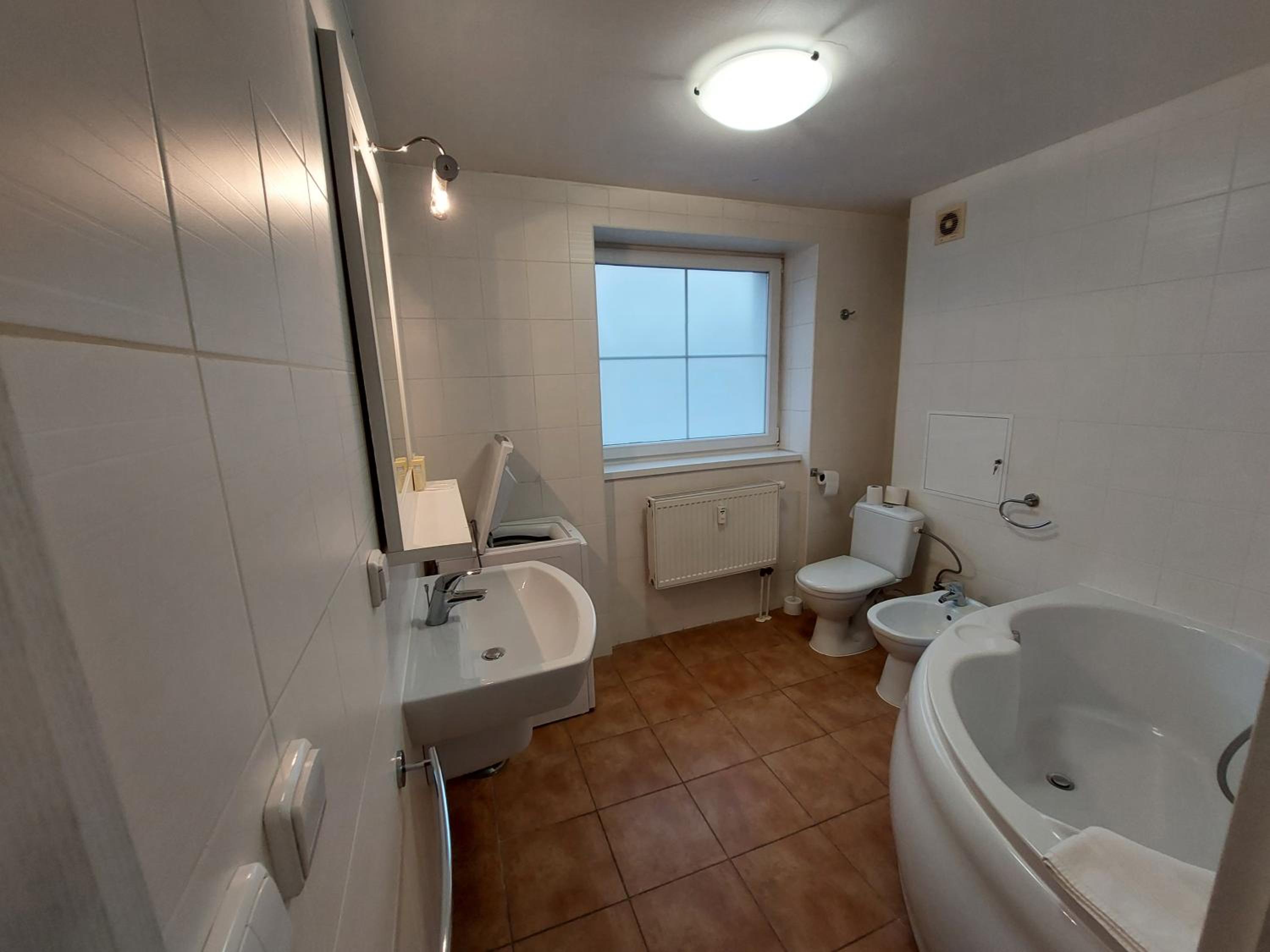 Three-Bedroom Apartment - Photo 2