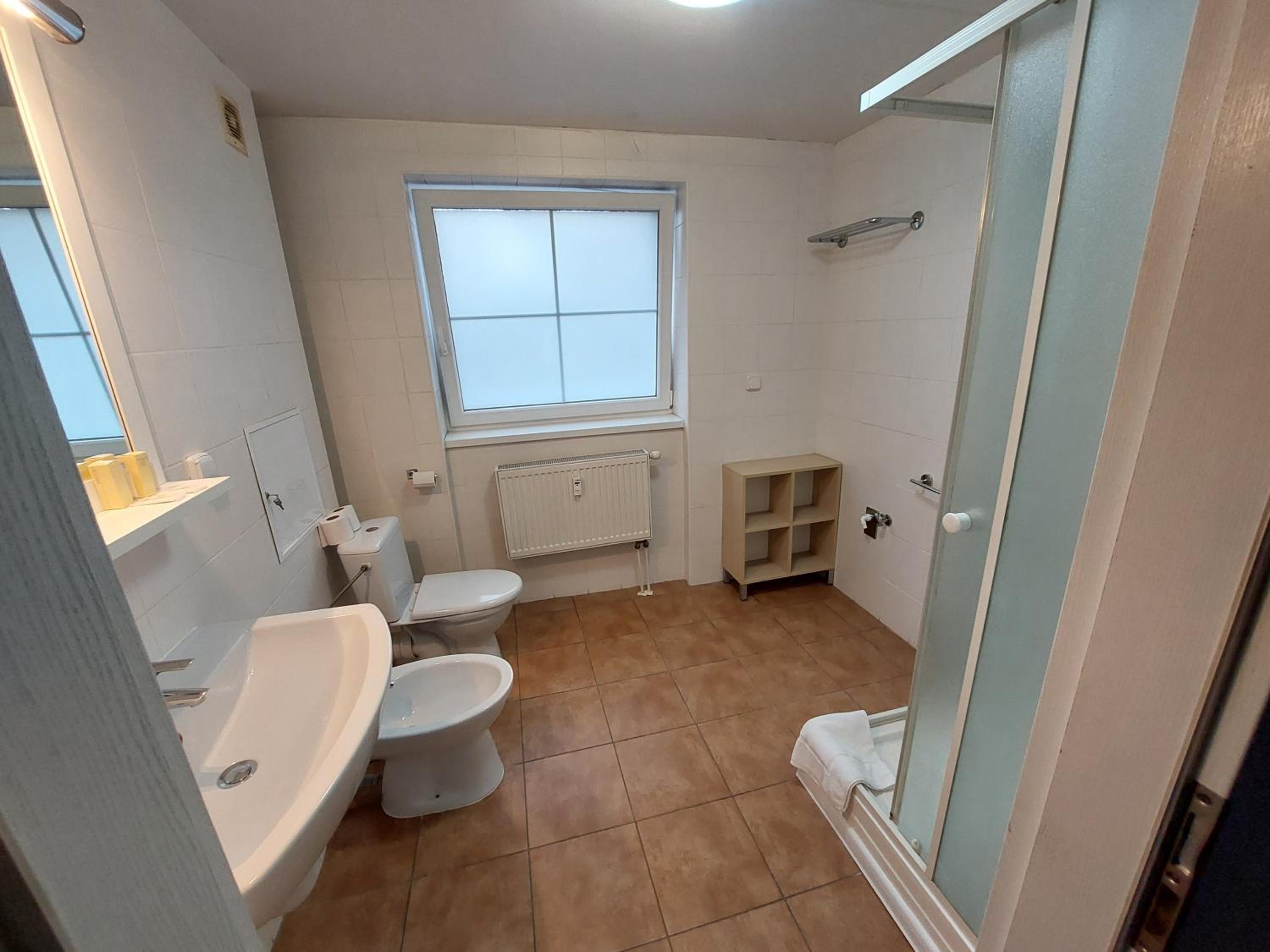 Three-Bedroom Apartment - Photo 4
