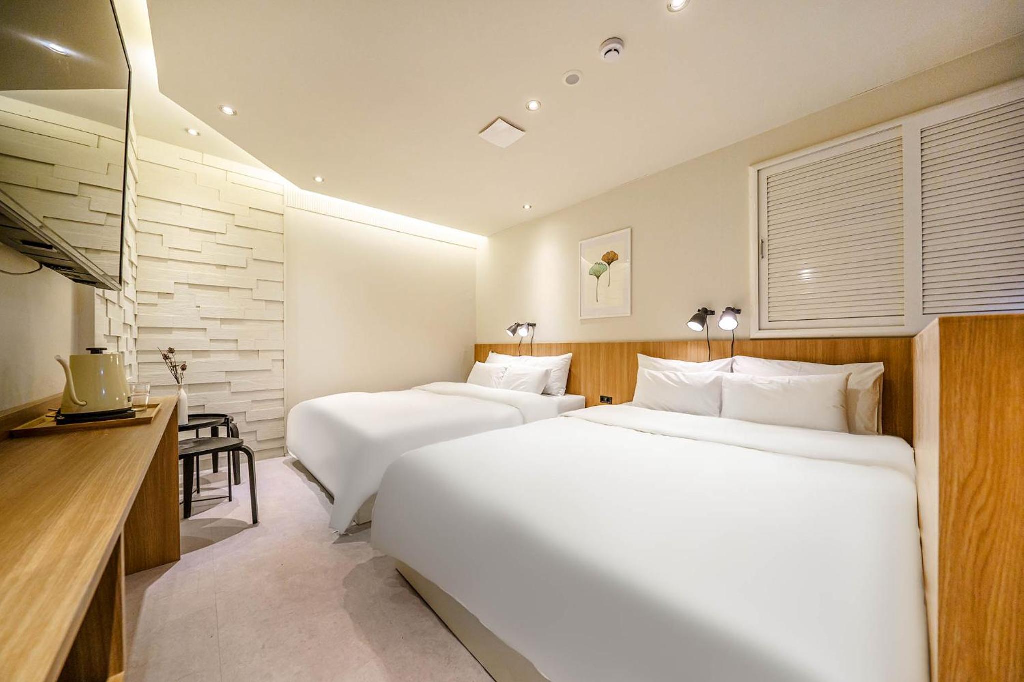 Deluxe Queen Room with Two Queen Beds - Photo 1