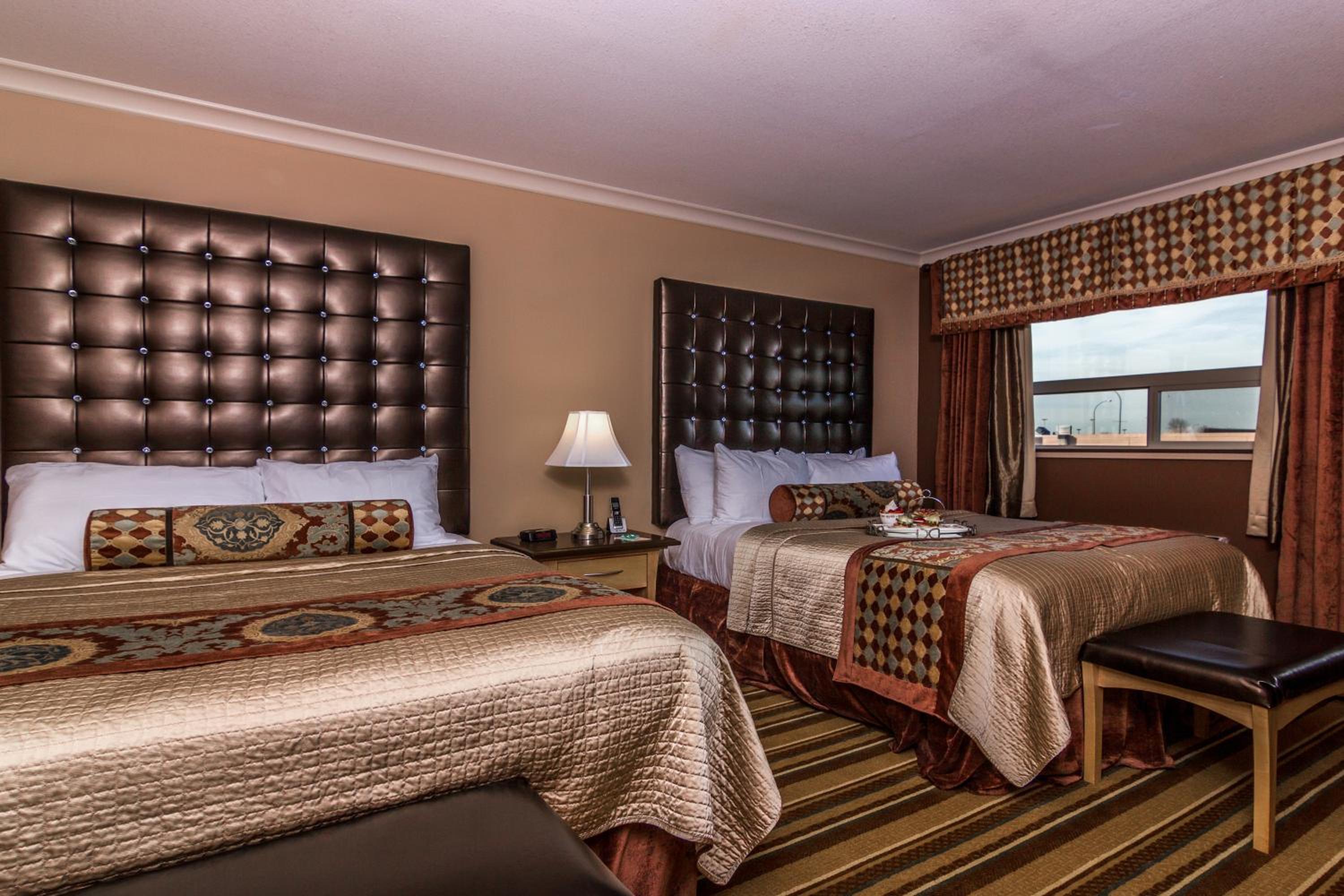 Queen Suite with Two Queen Beds and Kitchenette - Non-Smoking photo 1