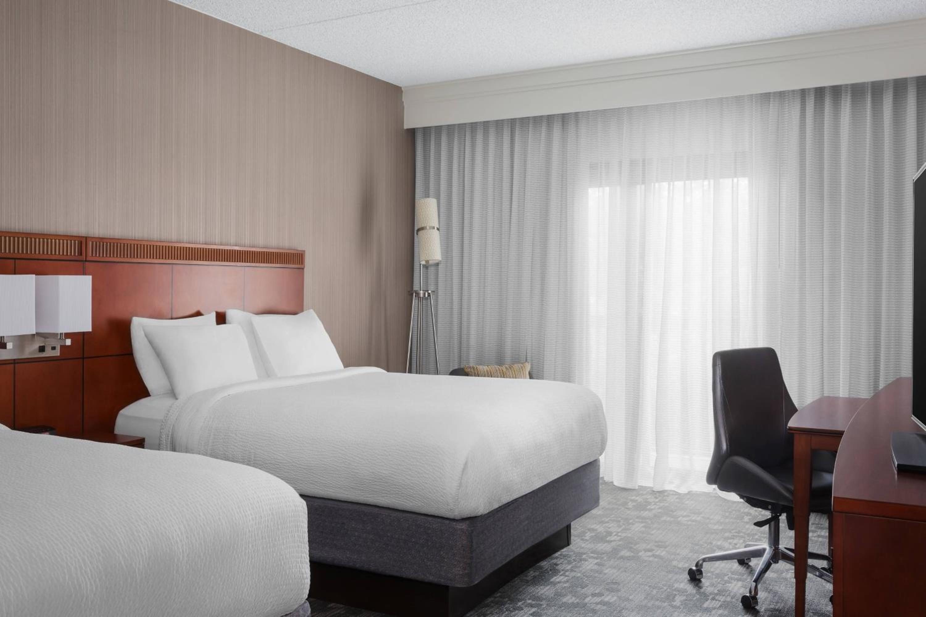 Queen Room with Two Queen Beds - Hearing Accessible - Photo 1