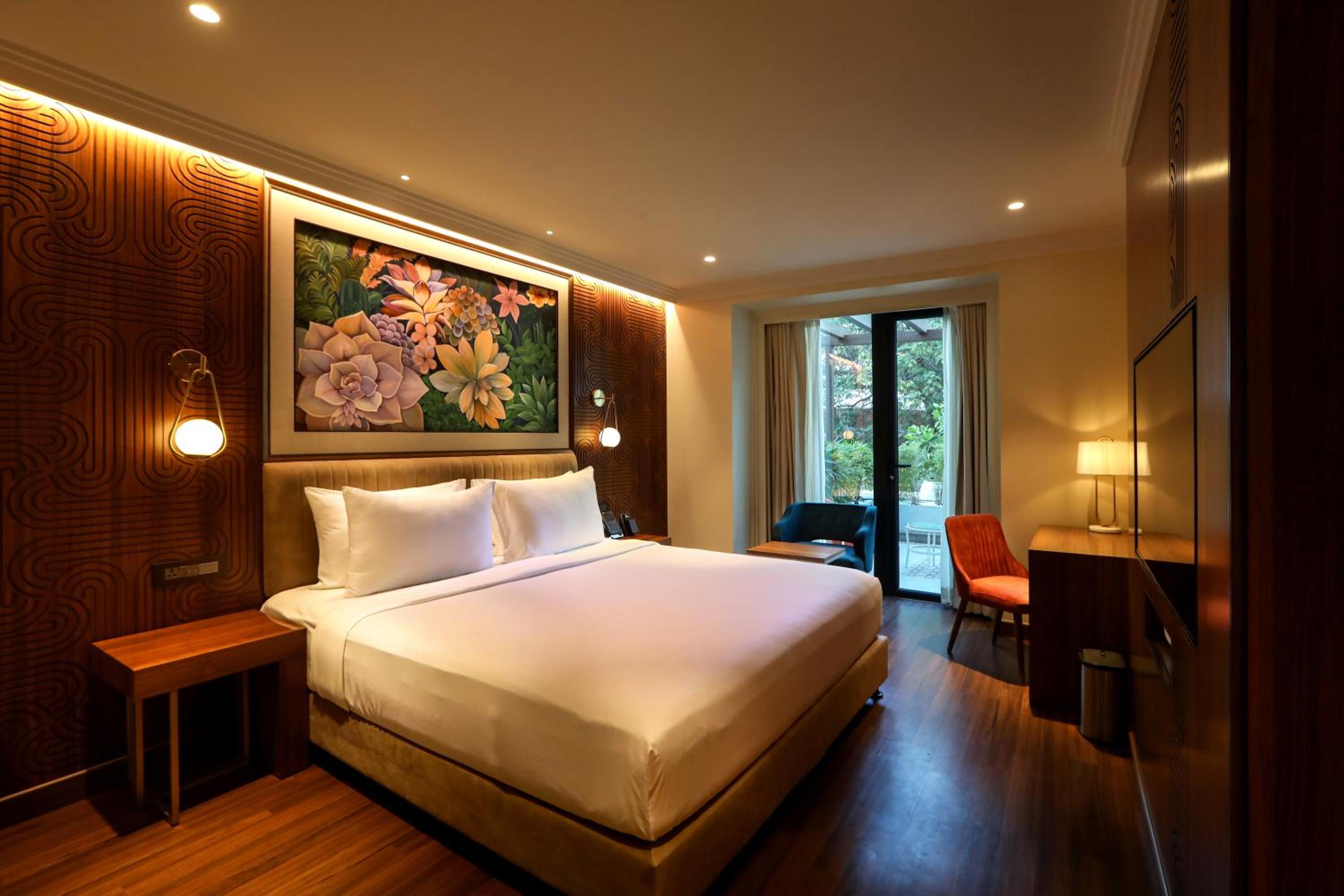 Business Class Garden Balcony with Airport Transfers