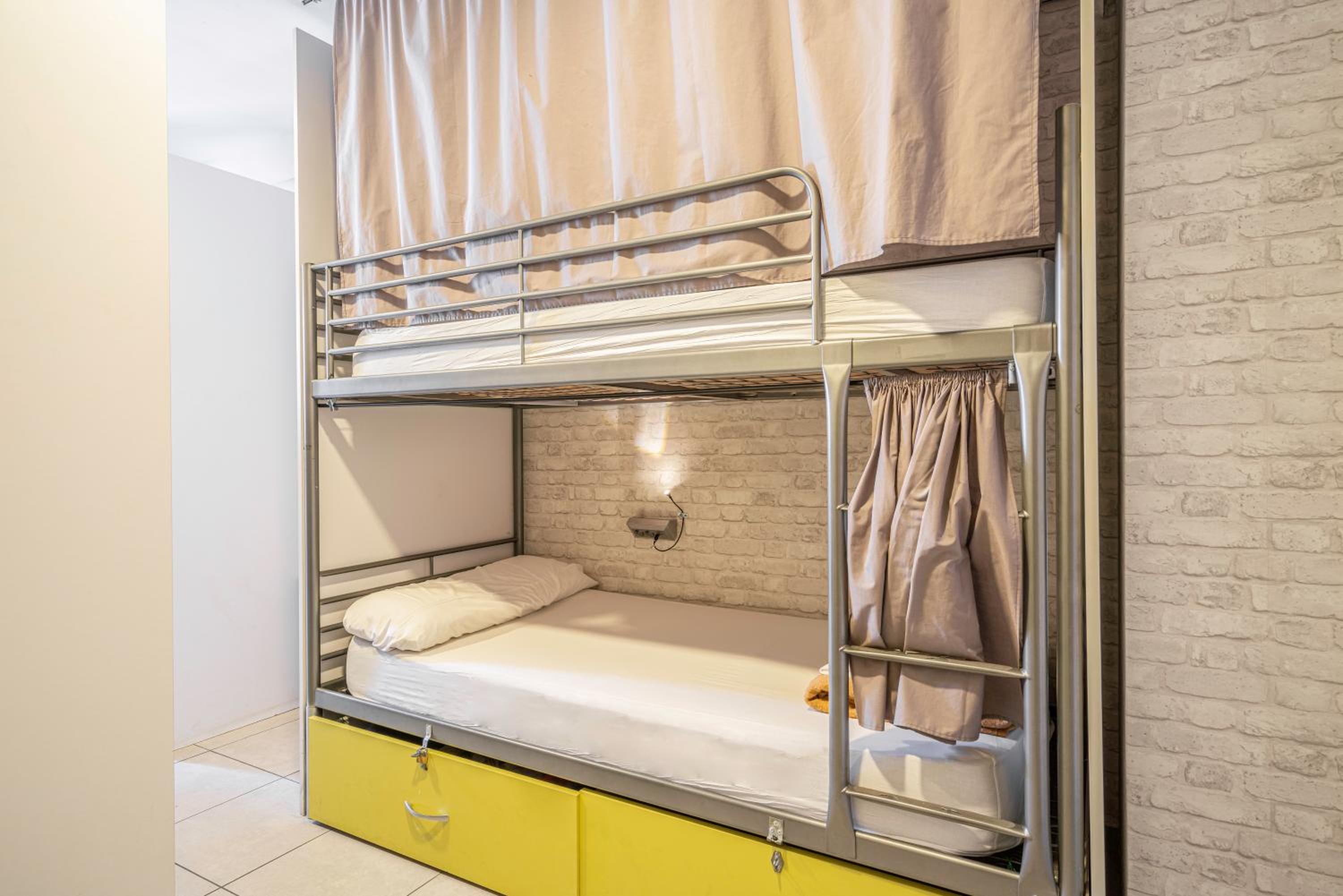 Bed in 8-Bed Mixed Dormitory Room with Private Balcony photo 3