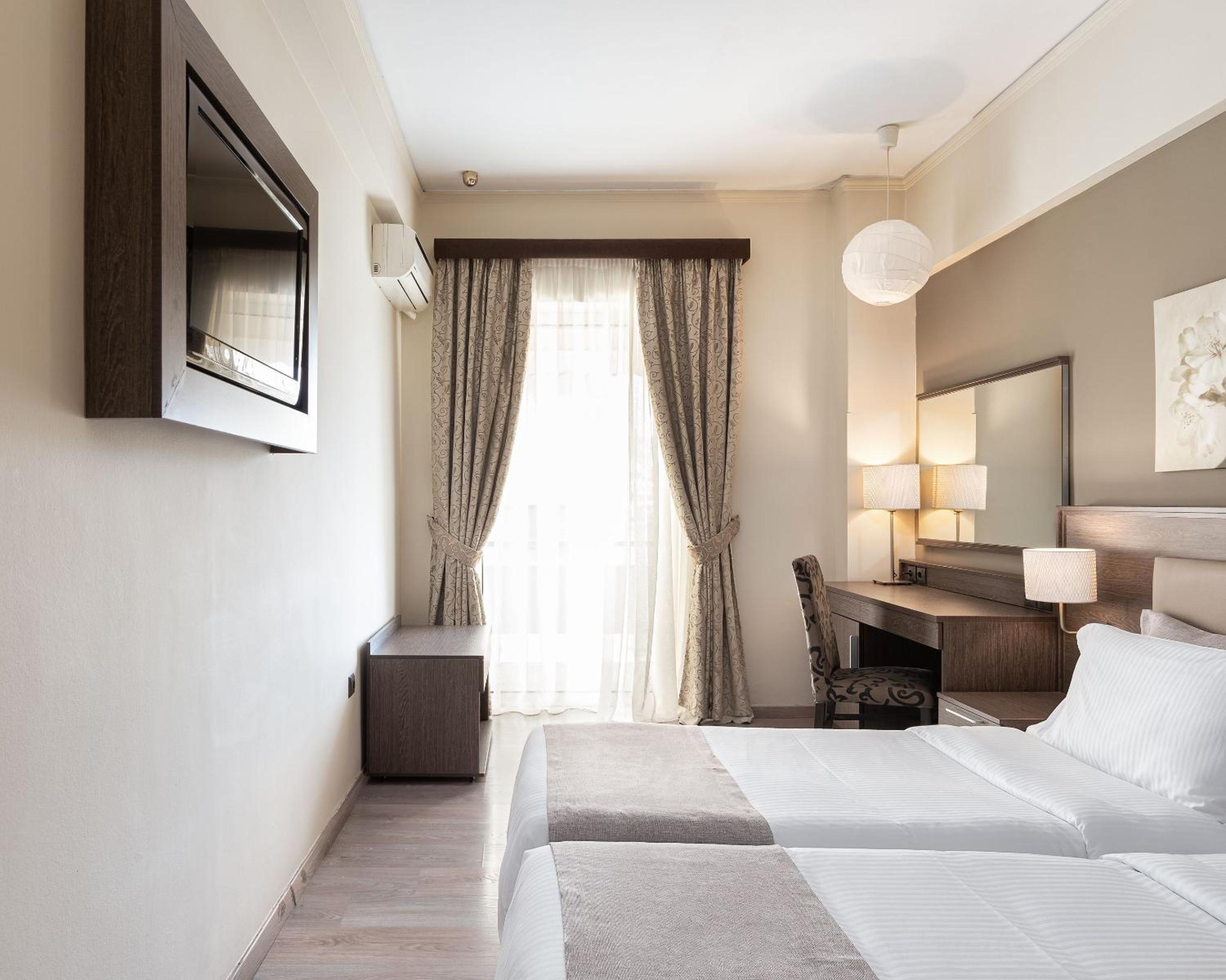 Twin Room - Photo 1