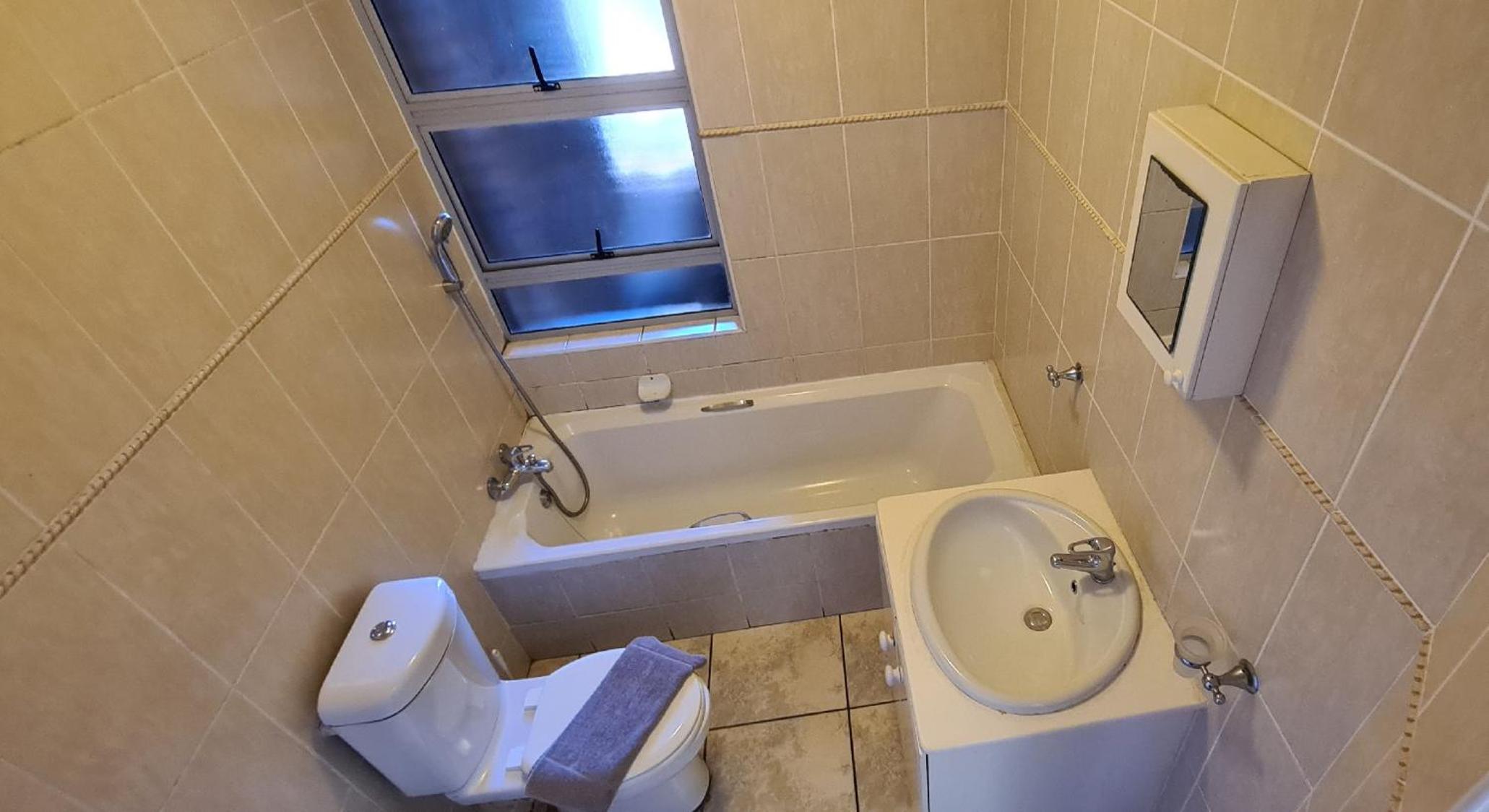 Three-Bedroom Apartment - Photo 10