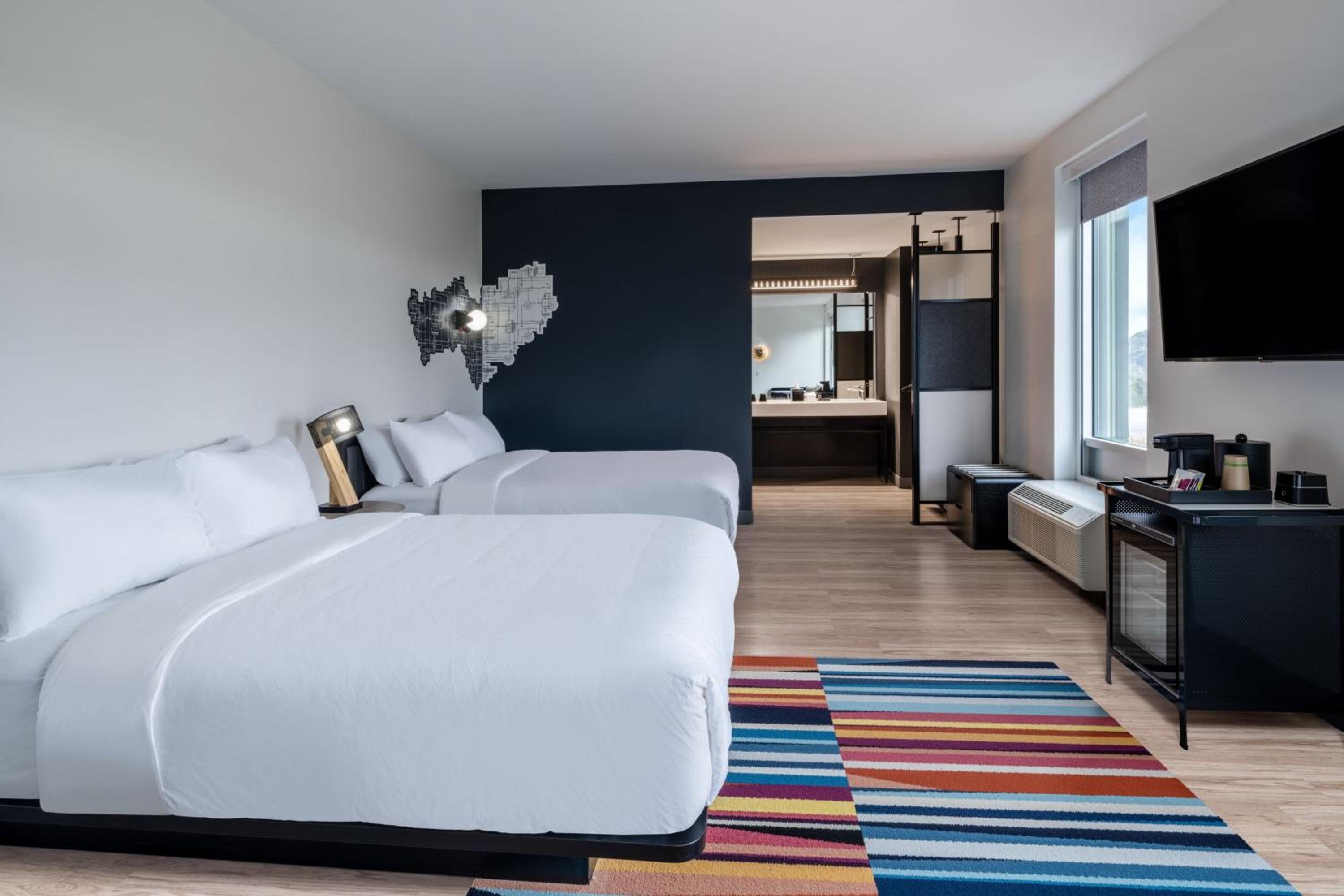 Queen Room with Two Queen Beds - Photo 1