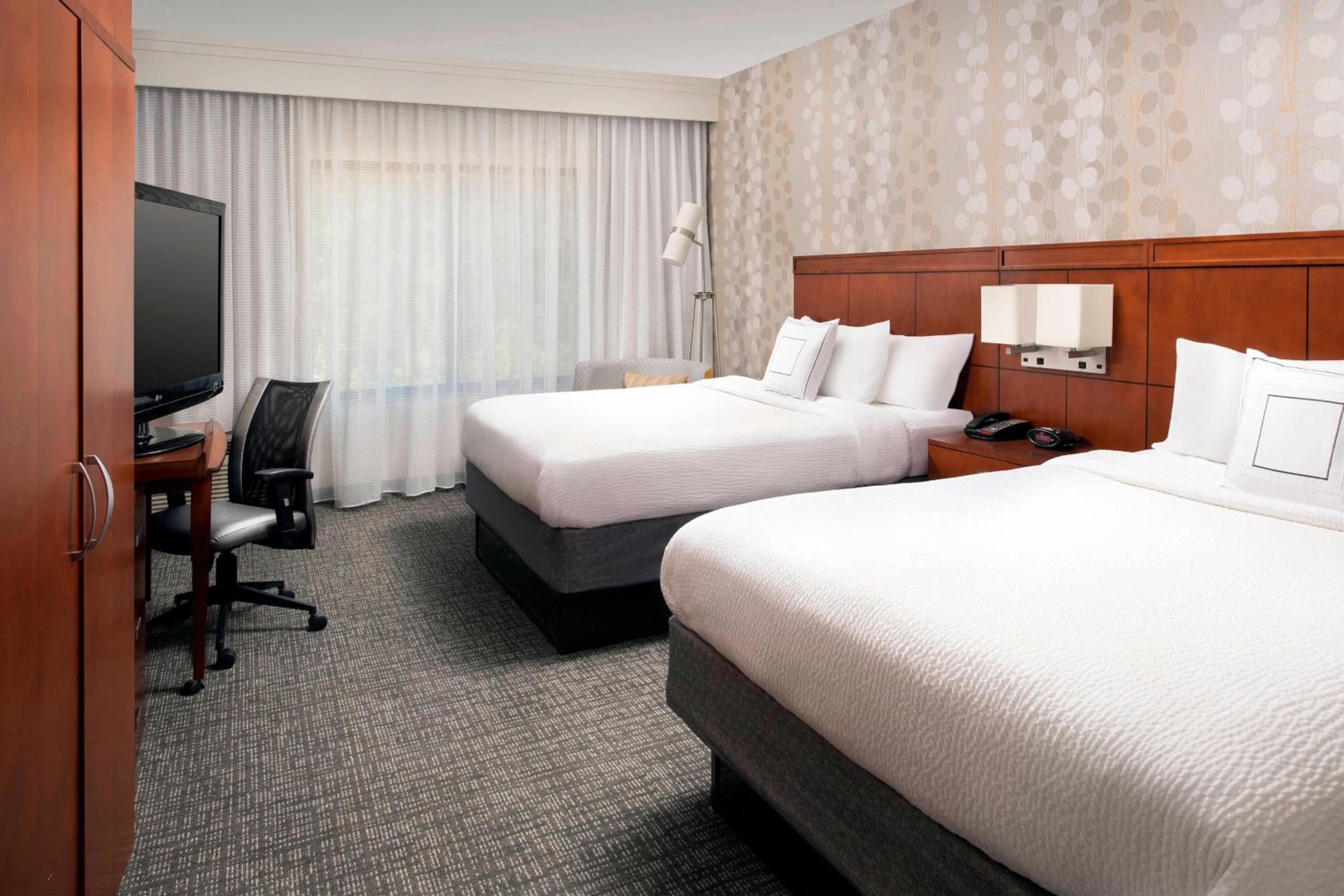 Queen Room with Two Queen Beds - Photo 1