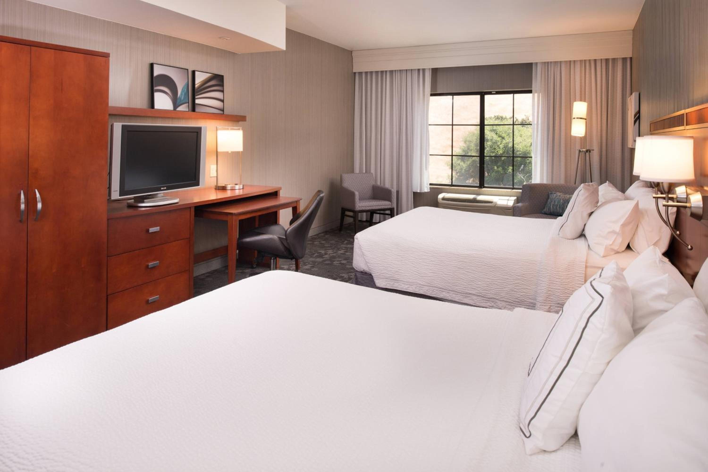 Queen Room with Two Queen Beds - Photo 1