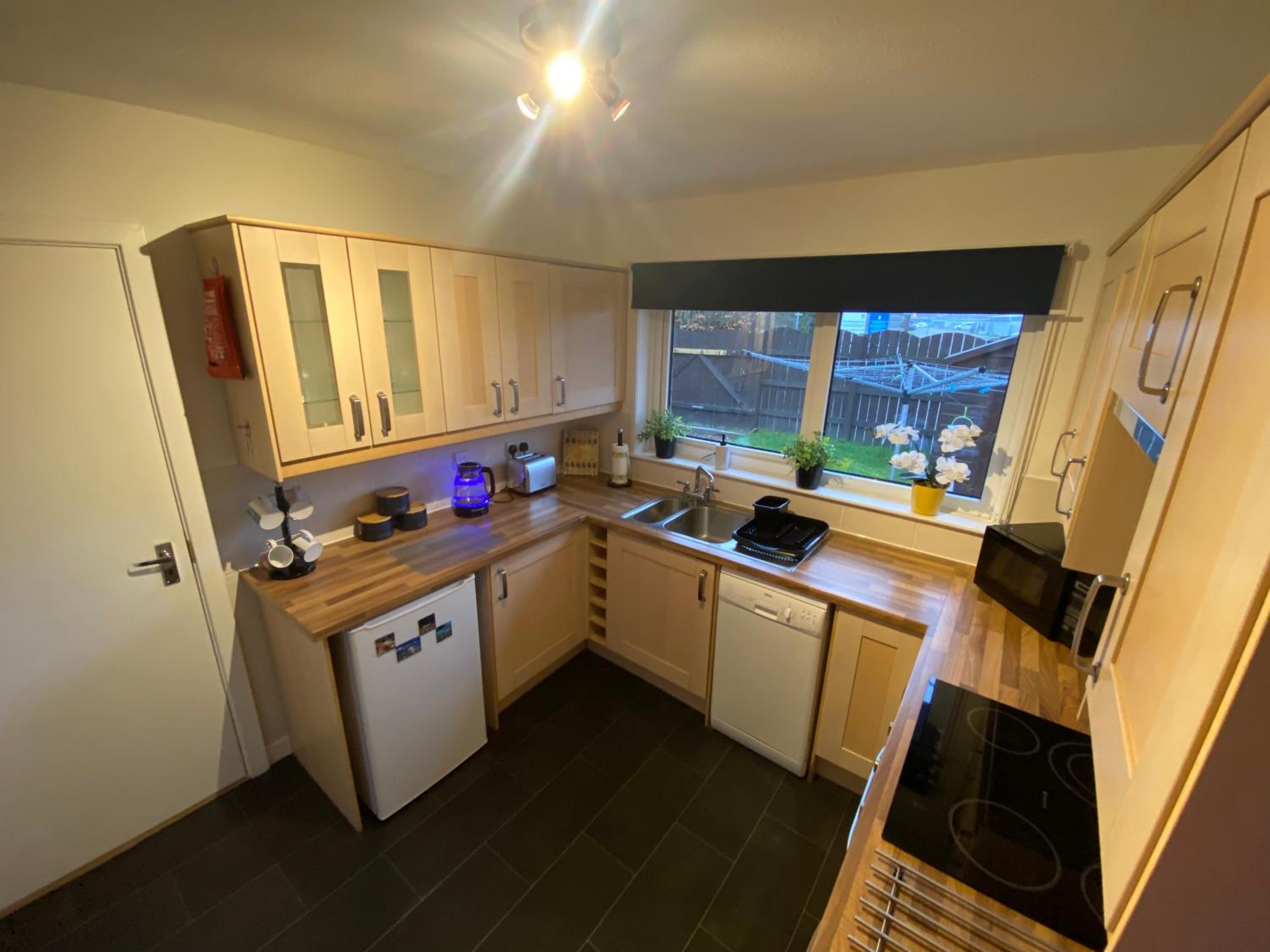Three-Bedroom Apartment - Photo 12