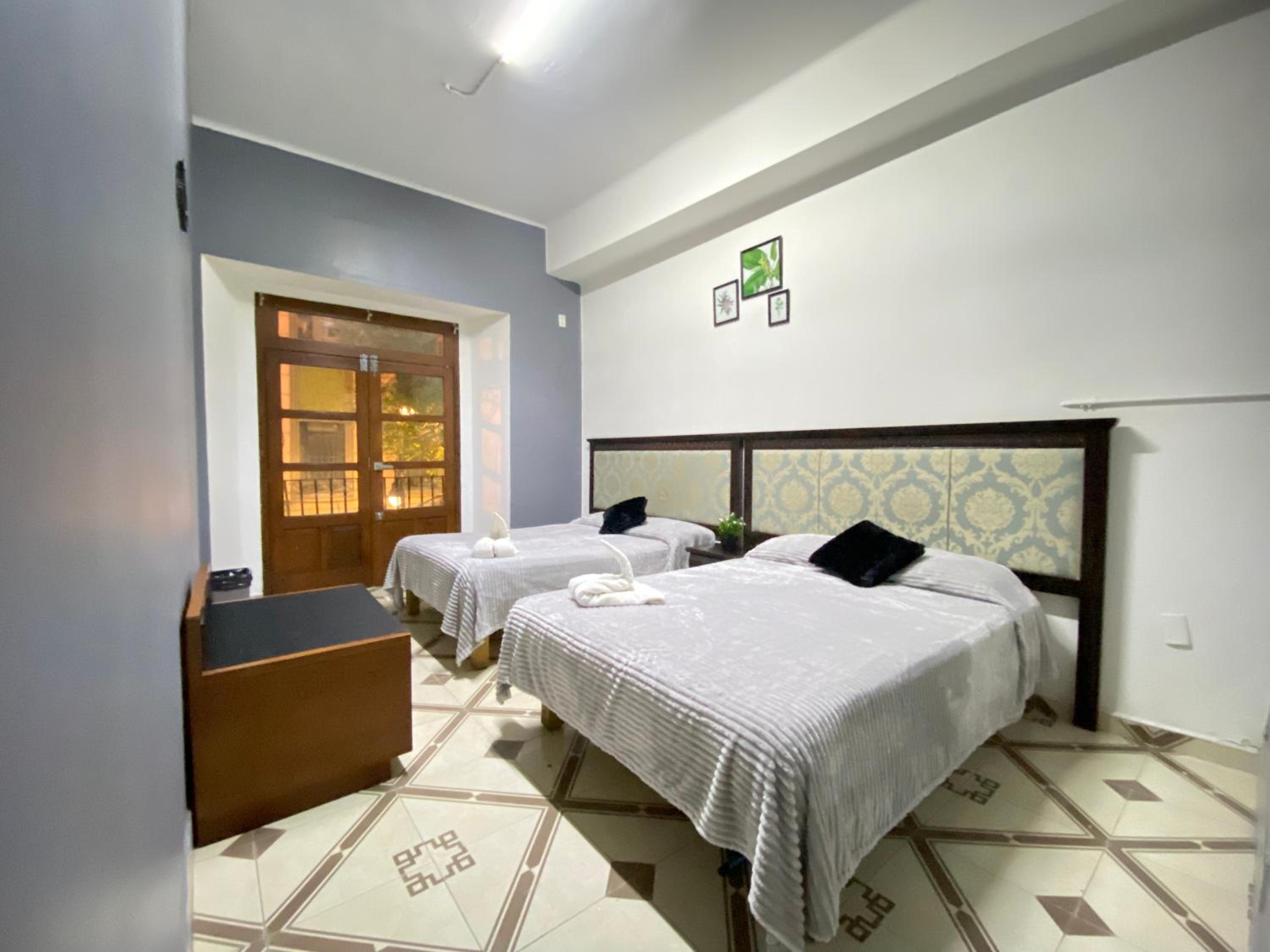 Quadruple Room with Balcony