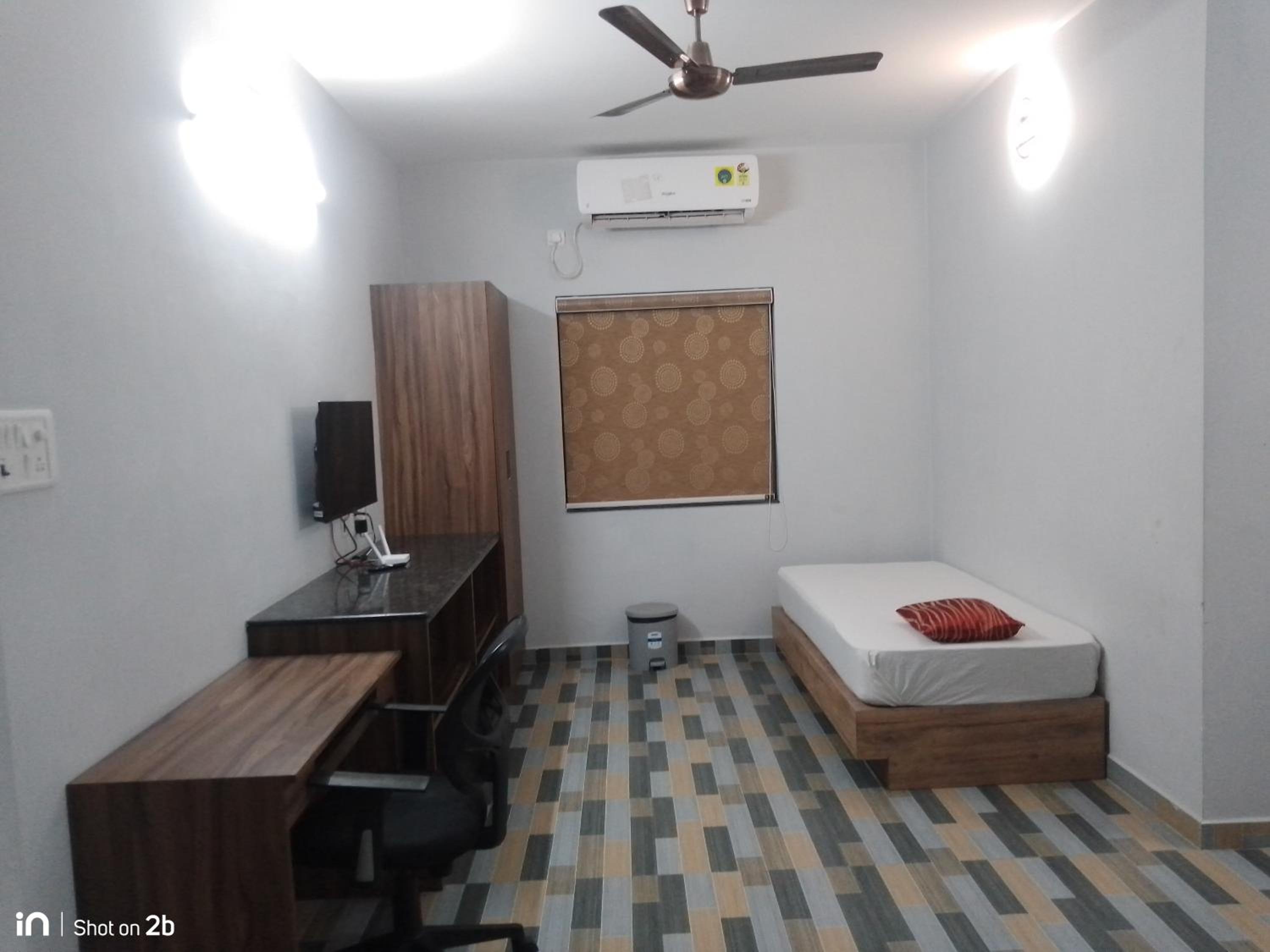 Two-Bedroom Apartment - Photo 25