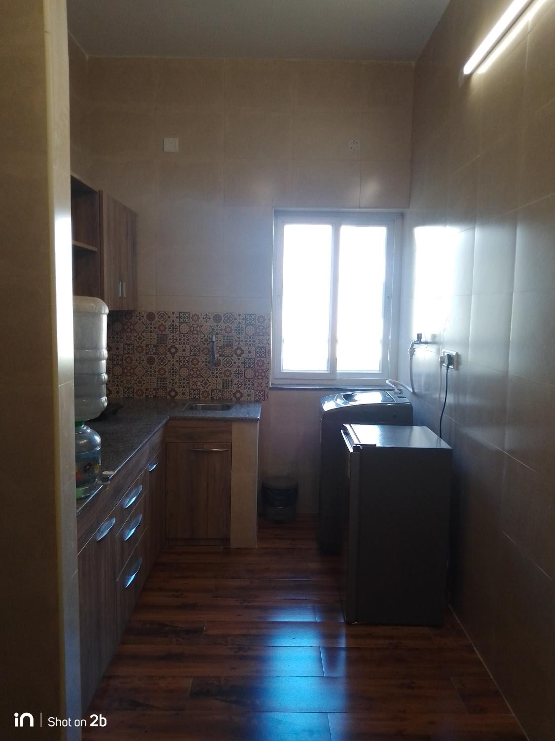 Two-Bedroom Apartment - Photo 32
