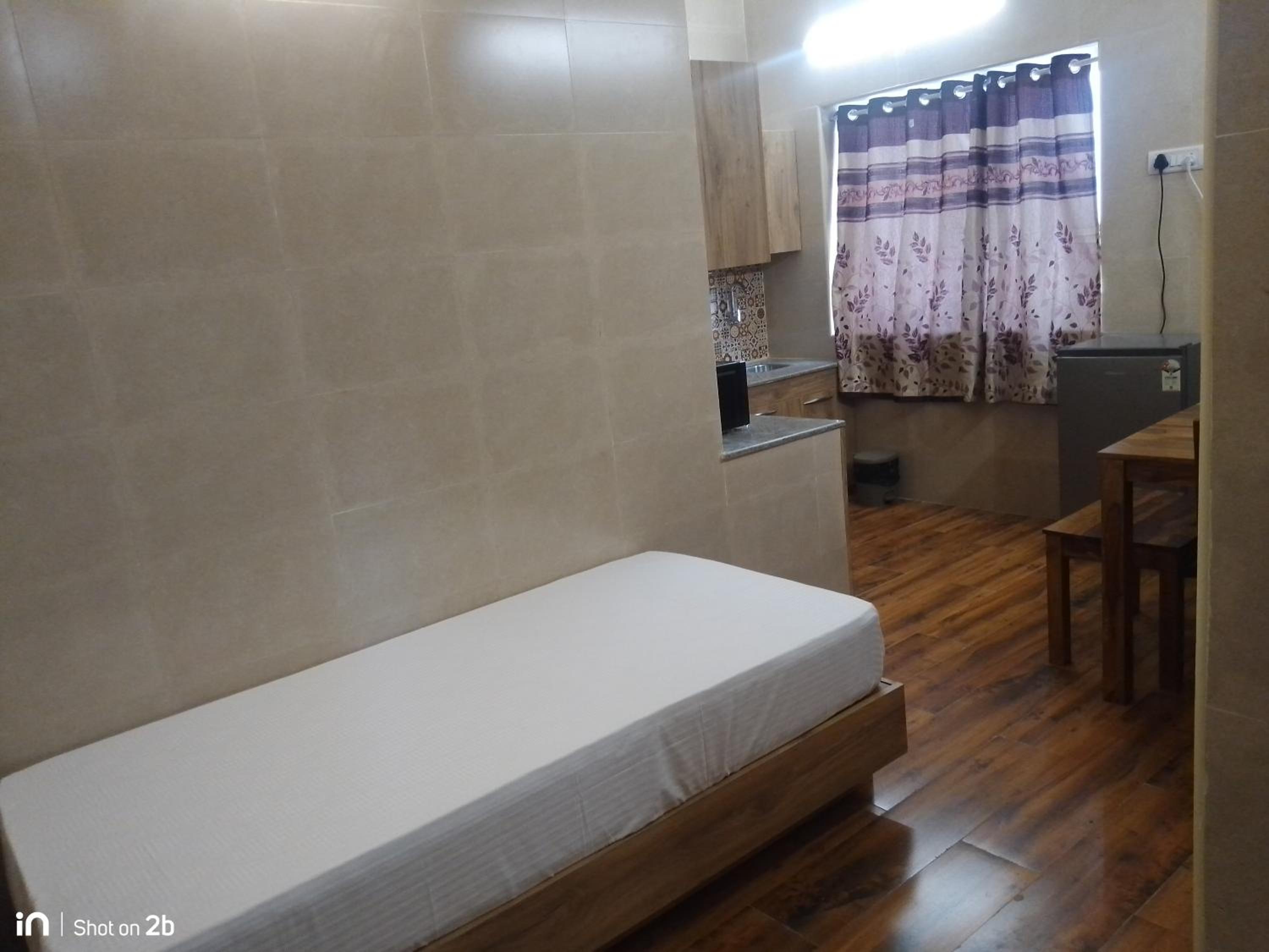 Two-Bedroom Apartment - Photo 28