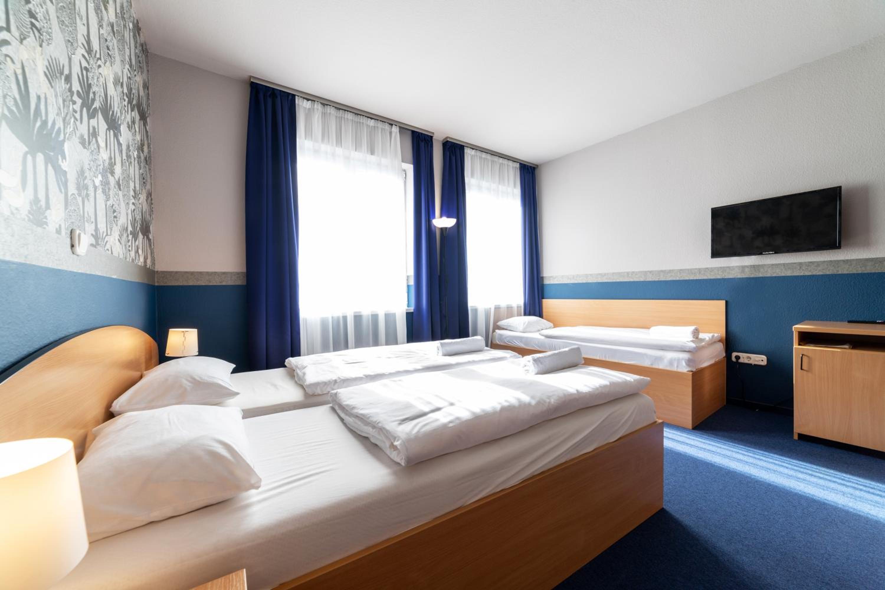 Triple Room - Photo 1